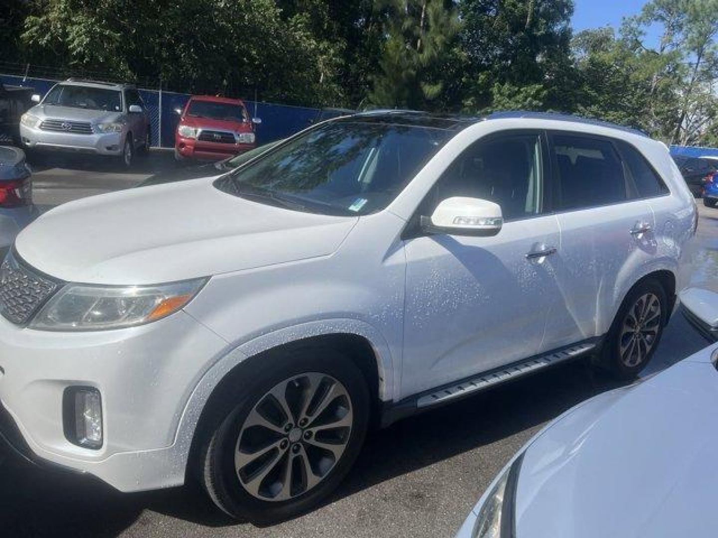 2014 Snow White Pearl /Black Kia Sorento (5XYKW4A77EG) with an 6 3.3 L engine, Automatic transmission, located at 27610 S Dixie Hwy, Homestead, FL, 33032, (305) 749-2348, 25.510241, -80.438301 - IIHS Top Safety Pick. Scores 25 Highway MPG and 18 City MPG! This Kia Sorento boasts a Regular Unleaded V-6 3.3 L/204 engine powering this Automatic transmission. SX SIDE STEPS, SNOW WHITE PEARL, BLACK, LEATHER SEAT TRIM.*This Kia Sorento Comes Equipped with These Options *3RD ROW PACKAGE -inc: 3rd - Photo#0