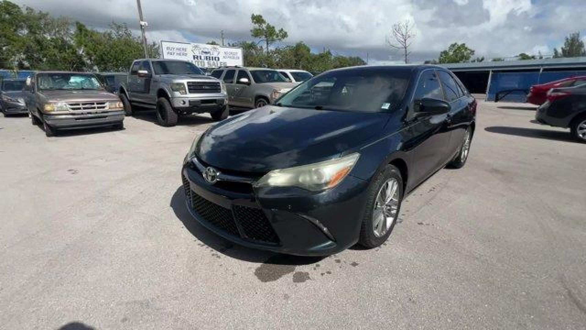 2016 Black Toyota Camry (4T1BF1FK6GU) with an 4 2.5 L engine, Automatic transmission, located at 27610 S Dixie Hwy, Homestead, FL, 33032, (305) 749-2348, 25.510241, -80.438301 - KBB.com 10 Most Comfortable Cars Under $30,000. Scores 35 Highway MPG and 25 City MPG! This Toyota Camry delivers a Regular Unleaded I-4 2.5 L/152 engine powering this Automatic transmission. Window Grid Antenna, Variable Intermittent Wipers, Valet Function.* This Toyota Camry Features the Following - Photo#0