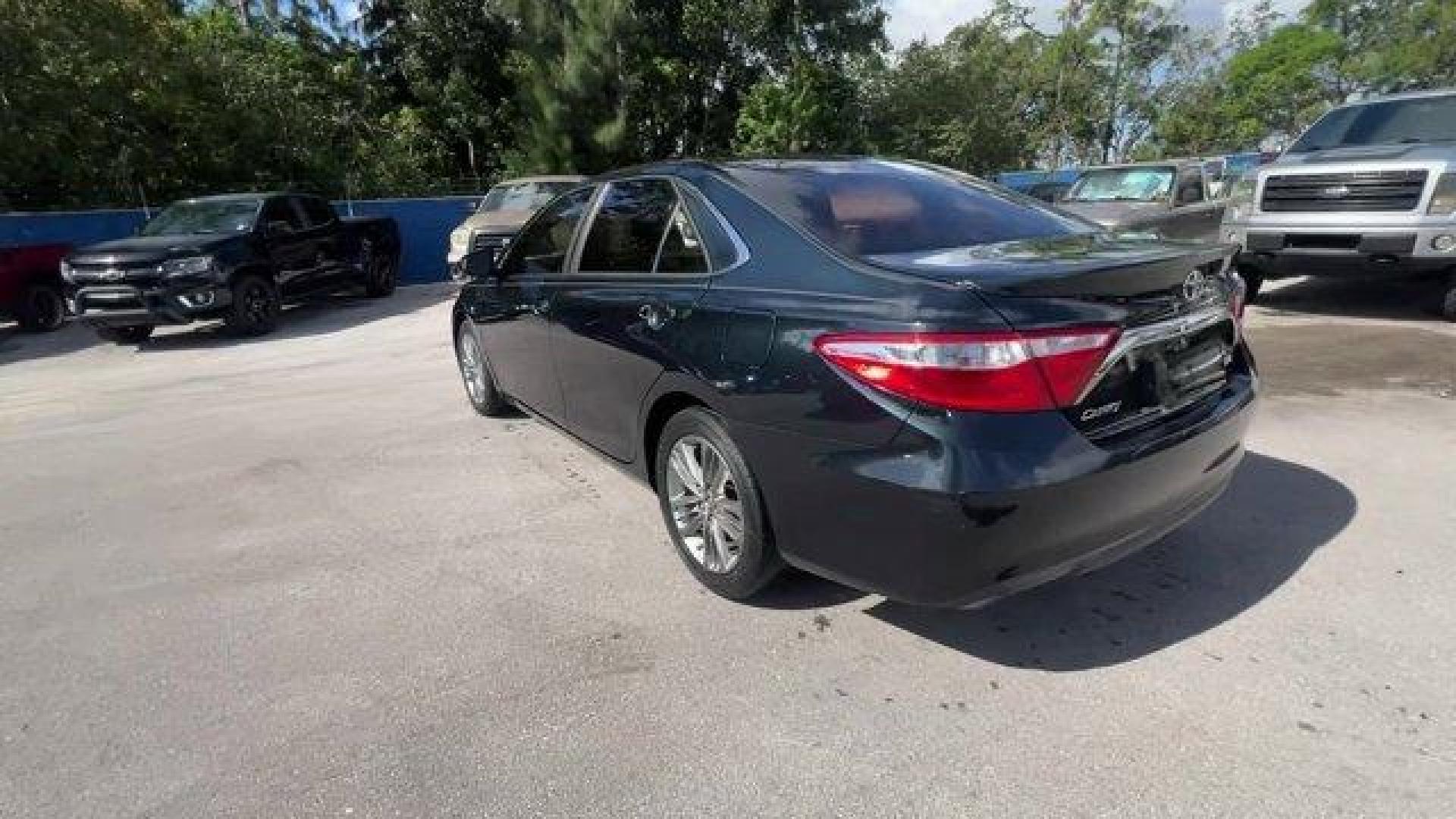 2016 Black Toyota Camry (4T1BF1FK6GU) with an 4 2.5 L engine, Automatic transmission, located at 27610 S Dixie Hwy, Homestead, FL, 33032, (305) 749-2348, 25.510241, -80.438301 - KBB.com 10 Most Comfortable Cars Under $30,000. Scores 35 Highway MPG and 25 City MPG! This Toyota Camry delivers a Regular Unleaded I-4 2.5 L/152 engine powering this Automatic transmission. Window Grid Antenna, Variable Intermittent Wipers, Valet Function.* This Toyota Camry Features the Following - Photo#2