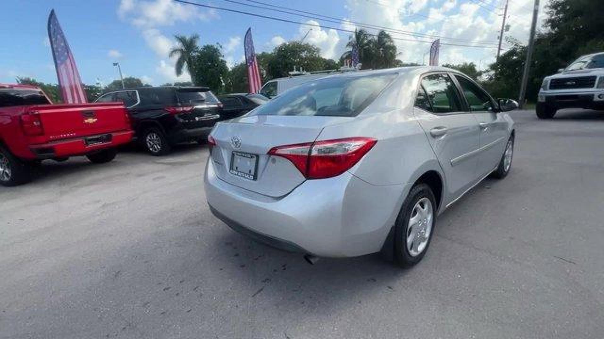 2014 Silver Toyota Corolla (2T1BURHE7EC) with an 4 1.8 L engine, Automatic transmission, located at 27610 S Dixie Hwy, Homestead, FL, 33032, (305) 749-2348, 25.510241, -80.438301 - KBB.com 10 Tech-Savviest Cars Under $20,000. Only 90,575 Miles! This Toyota Corolla boasts a Regular Unleaded I-4 1.8 L/110 engine powering this Automatic transmission. Window Grid Antenna, Urethane Gear Shifter Material, Trunk Rear Cargo Access.* This Toyota Corolla Features the Following Options * - Photo#4