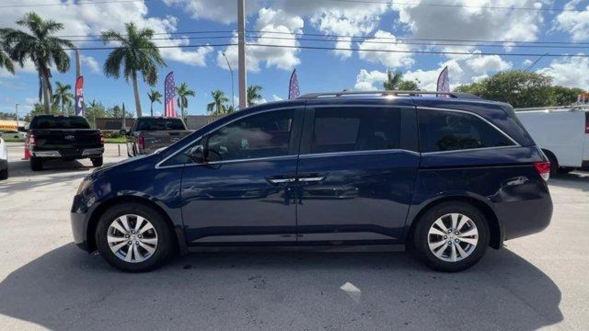 2016 Blue Honda Odyssey (5FNRL5H30GB) with an 6 3.5 L engine, Automatic transmission, located at 27610 S Dixie Hwy, Homestead, FL, 33032, (305) 749-2348, 25.510241, -80.438301 - ALG Residual Value Awards, Residual Value Awards. Boasts 28 Highway MPG and 19 City MPG! This Honda Odyssey delivers a Regular Unleaded V-6 3.5 L/212 engine powering this Automatic transmission. Window Grid Antenna, Wheels: 17 x 7 Alloy, VSA Electronic Stability Control (ESC).*This Honda Odyssey Com - Photo#0