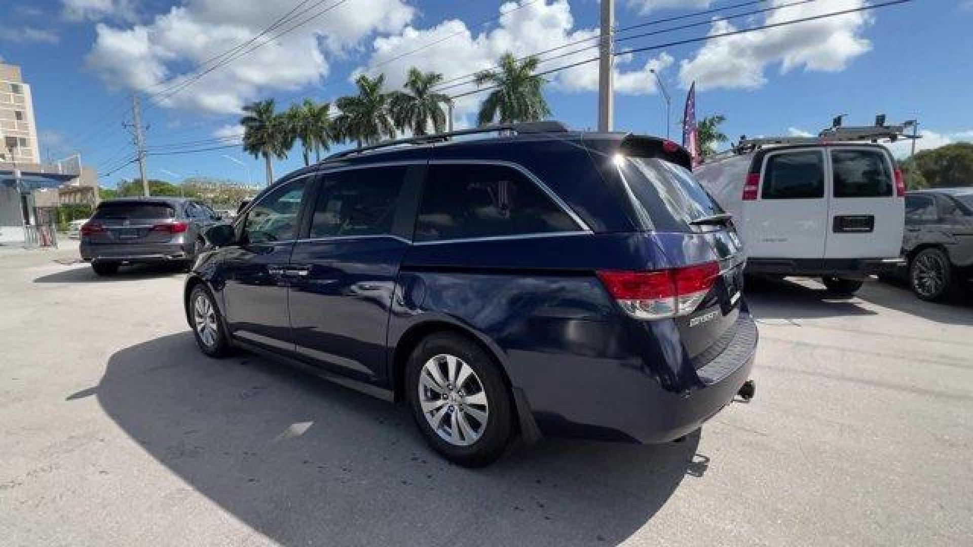 2016 Blue Honda Odyssey (5FNRL5H30GB) with an 6 3.5 L engine, Automatic transmission, located at 27610 S Dixie Hwy, Homestead, FL, 33032, (305) 749-2348, 25.510241, -80.438301 - ALG Residual Value Awards, Residual Value Awards. Boasts 28 Highway MPG and 19 City MPG! This Honda Odyssey delivers a Regular Unleaded V-6 3.5 L/212 engine powering this Automatic transmission. Window Grid Antenna, Wheels: 17 x 7 Alloy, VSA Electronic Stability Control (ESC).*This Honda Odyssey Com - Photo#1