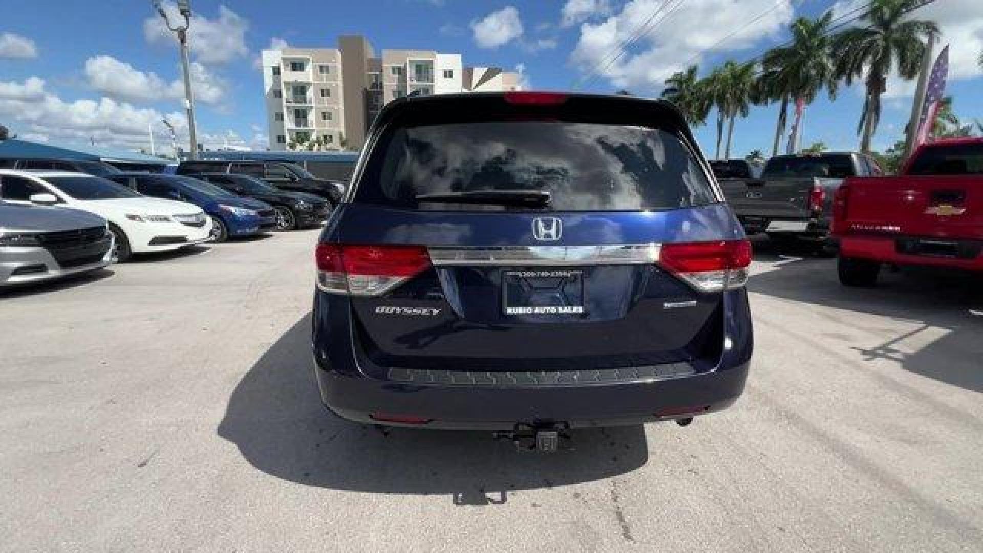 2016 Blue Honda Odyssey (5FNRL5H30GB) with an 6 3.5 L engine, Automatic transmission, located at 27610 S Dixie Hwy, Homestead, FL, 33032, (305) 749-2348, 25.510241, -80.438301 - ALG Residual Value Awards, Residual Value Awards. Boasts 28 Highway MPG and 19 City MPG! This Honda Odyssey delivers a Regular Unleaded V-6 3.5 L/212 engine powering this Automatic transmission. Window Grid Antenna, Wheels: 17 x 7 Alloy, VSA Electronic Stability Control (ESC).*This Honda Odyssey Com - Photo#2