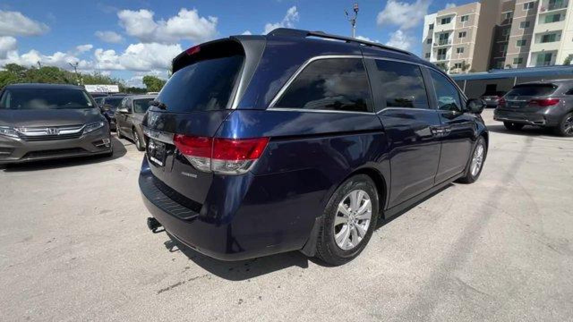 2016 Blue Honda Odyssey (5FNRL5H30GB) with an 6 3.5 L engine, Automatic transmission, located at 27610 S Dixie Hwy, Homestead, FL, 33032, (305) 749-2348, 25.510241, -80.438301 - ALG Residual Value Awards, Residual Value Awards. Boasts 28 Highway MPG and 19 City MPG! This Honda Odyssey delivers a Regular Unleaded V-6 3.5 L/212 engine powering this Automatic transmission. Window Grid Antenna, Wheels: 17 x 7 Alloy, VSA Electronic Stability Control (ESC).*This Honda Odyssey Com - Photo#3