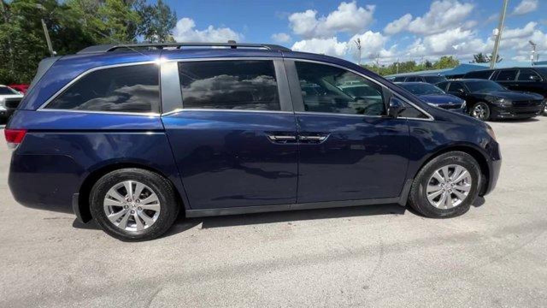 2016 Blue Honda Odyssey (5FNRL5H30GB) with an 6 3.5 L engine, Automatic transmission, located at 27610 S Dixie Hwy, Homestead, FL, 33032, (305) 749-2348, 25.510241, -80.438301 - ALG Residual Value Awards, Residual Value Awards. Boasts 28 Highway MPG and 19 City MPG! This Honda Odyssey delivers a Regular Unleaded V-6 3.5 L/212 engine powering this Automatic transmission. Window Grid Antenna, Wheels: 17 x 7 Alloy, VSA Electronic Stability Control (ESC).*This Honda Odyssey Com - Photo#4