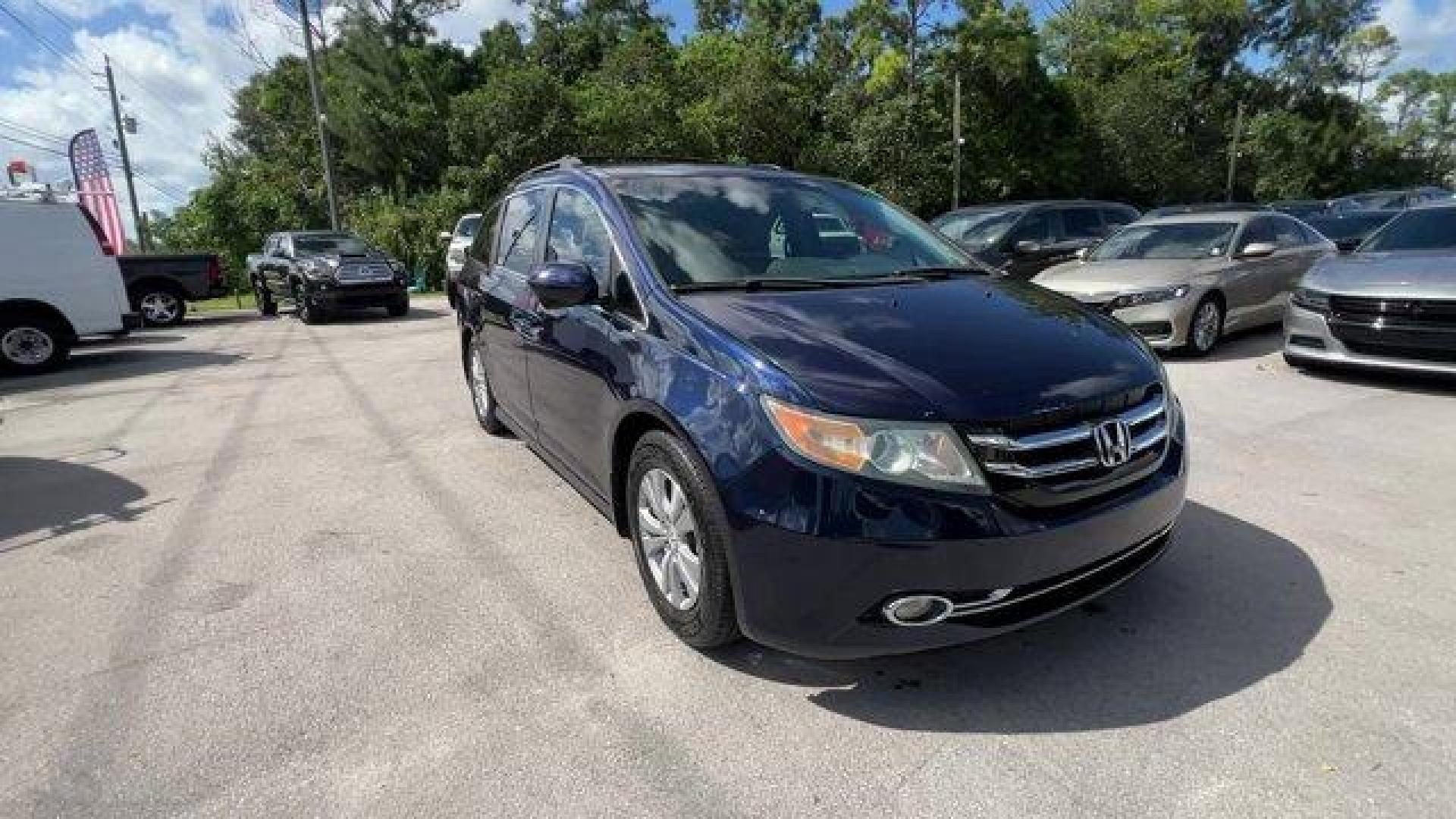 2016 Blue Honda Odyssey (5FNRL5H30GB) with an 6 3.5 L engine, Automatic transmission, located at 27610 S Dixie Hwy, Homestead, FL, 33032, (305) 749-2348, 25.510241, -80.438301 - ALG Residual Value Awards, Residual Value Awards. Boasts 28 Highway MPG and 19 City MPG! This Honda Odyssey delivers a Regular Unleaded V-6 3.5 L/212 engine powering this Automatic transmission. Window Grid Antenna, Wheels: 17 x 7 Alloy, VSA Electronic Stability Control (ESC).*This Honda Odyssey Com - Photo#5