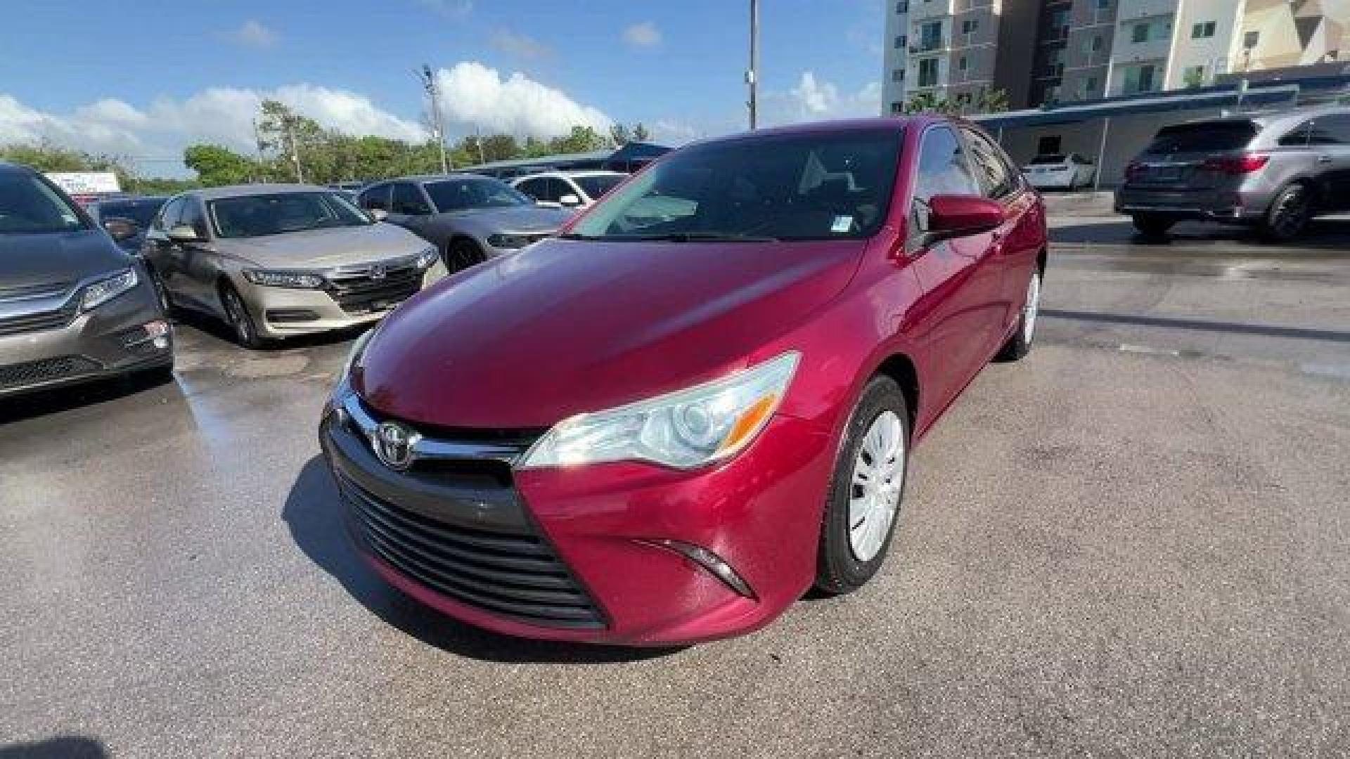 2015 Red Toyota Camry (4T1BF1FK2FU) with an 4 2.5 L engine, Automatic transmission, located at 27610 S Dixie Hwy, Homestead, FL, 33032, (305) 749-2348, 25.510241, -80.438301 - KBB.com 15 Best Family Cars. Delivers 35 Highway MPG and 25 City MPG! This Toyota Camry boasts a Regular Unleaded I-4 2.5 L/152 engine powering this Automatic transmission. Window Grid Antenna, Variable Intermittent Wipers, Valet Function.* This Toyota Camry Features the Following Options *Trunk Rea - Photo#0