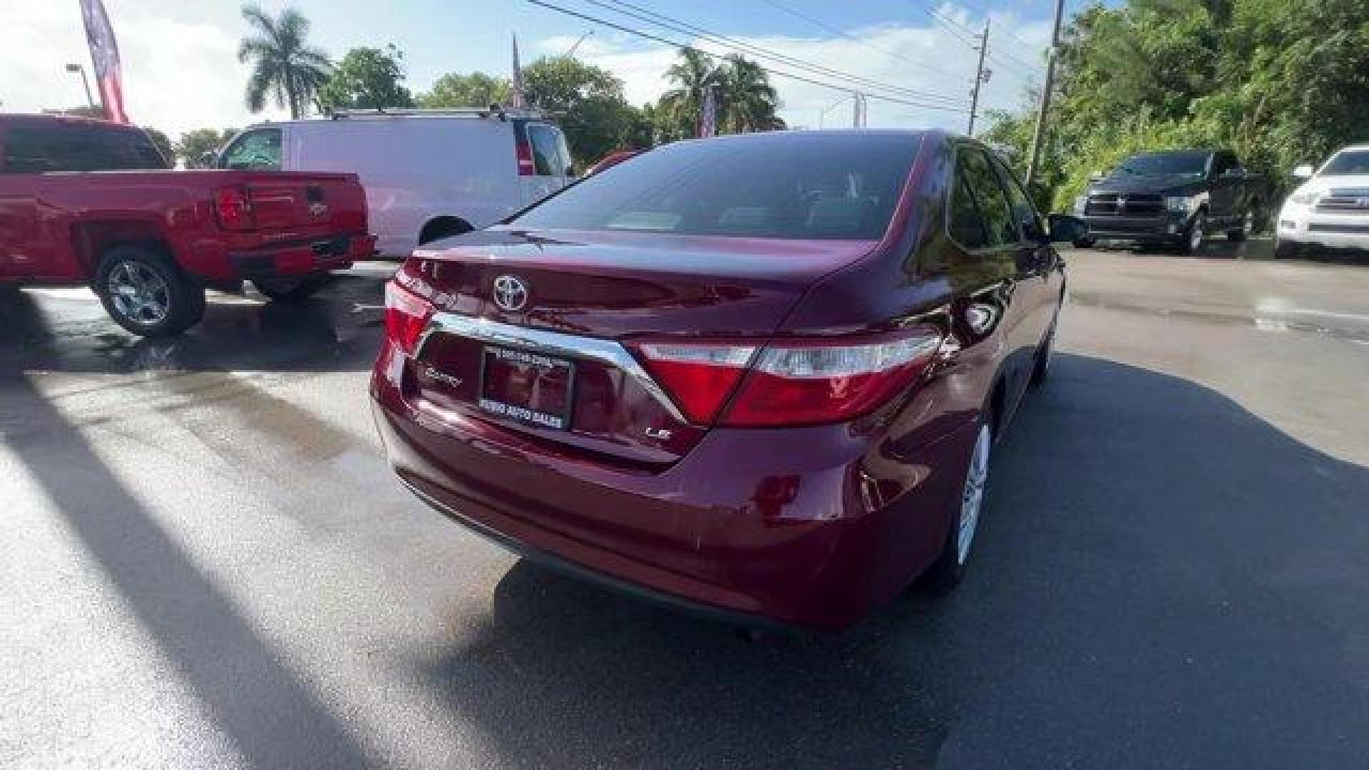 2015 Red Toyota Camry (4T1BF1FK2FU) with an 4 2.5 L engine, Automatic transmission, located at 27610 S Dixie Hwy, Homestead, FL, 33032, (305) 749-2348, 25.510241, -80.438301 - KBB.com 15 Best Family Cars. Delivers 35 Highway MPG and 25 City MPG! This Toyota Camry boasts a Regular Unleaded I-4 2.5 L/152 engine powering this Automatic transmission. Window Grid Antenna, Variable Intermittent Wipers, Valet Function.* This Toyota Camry Features the Following Options *Trunk Rea - Photo#4