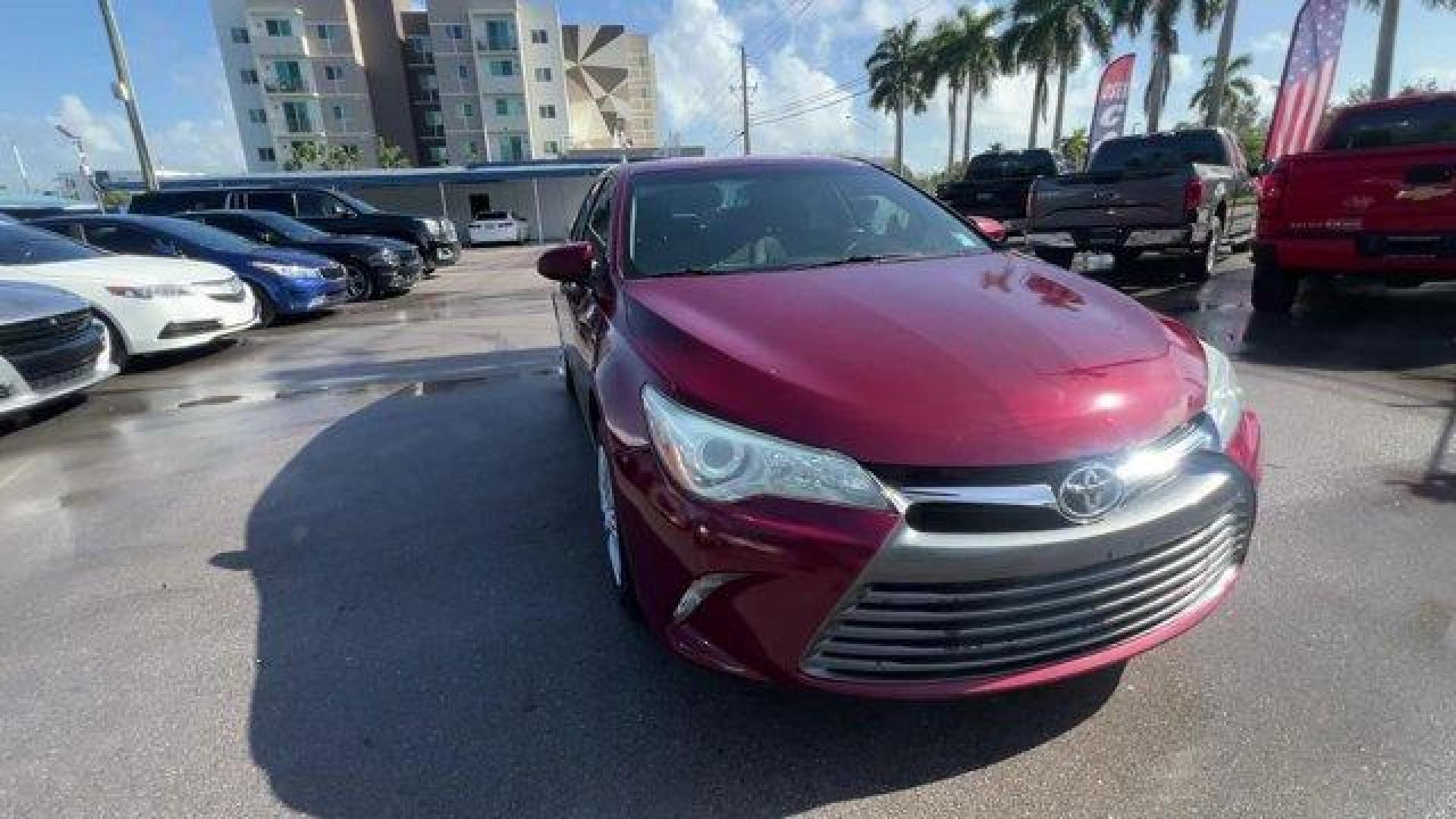 2015 Red Toyota Camry (4T1BF1FK2FU) with an 4 2.5 L engine, Automatic transmission, located at 27610 S Dixie Hwy, Homestead, FL, 33032, (305) 749-2348, 25.510241, -80.438301 - KBB.com 15 Best Family Cars. Delivers 35 Highway MPG and 25 City MPG! This Toyota Camry boasts a Regular Unleaded I-4 2.5 L/152 engine powering this Automatic transmission. Window Grid Antenna, Variable Intermittent Wipers, Valet Function.* This Toyota Camry Features the Following Options *Trunk Rea - Photo#6