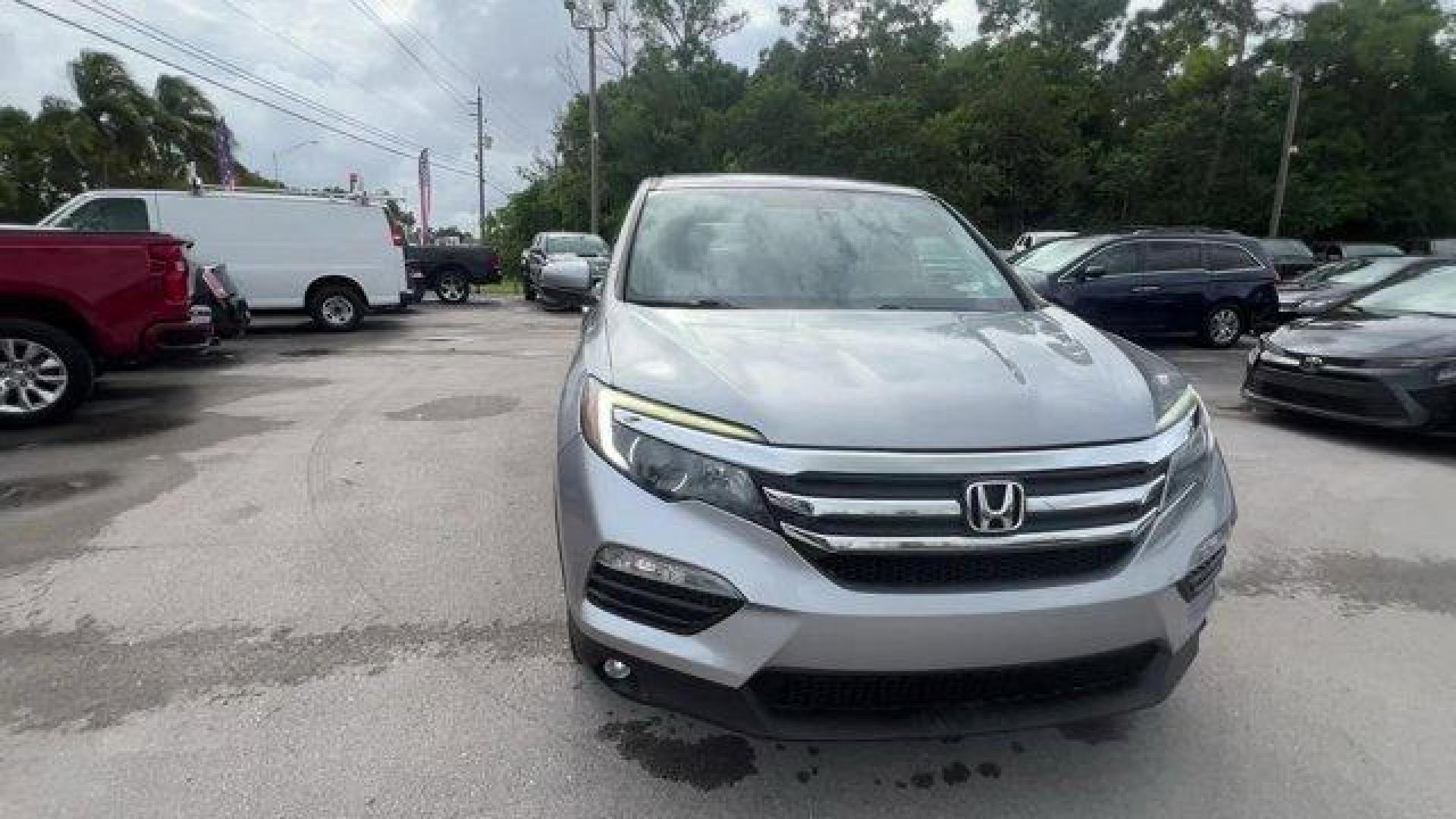 2017 Silver Honda Pilot (5FNYF5H36HB) with an 6 3.5 L engine, Automatic transmission, located at 27610 S Dixie Hwy, Homestead, FL, 33032, (305) 749-2348, 25.510241, -80.438301 - IIHS Top Safety Pick+. Boasts 27 Highway MPG and 19 City MPG! This Honda Pilot delivers a Regular Unleaded V-6 3.5 L/212 engine powering this Automatic transmission. Window Grid Antenna, Wheels: 18 Alloy, Wheels w/Machined Accents.* This Honda Pilot Features the Following Options *VSA Electronic Sta - Photo#7