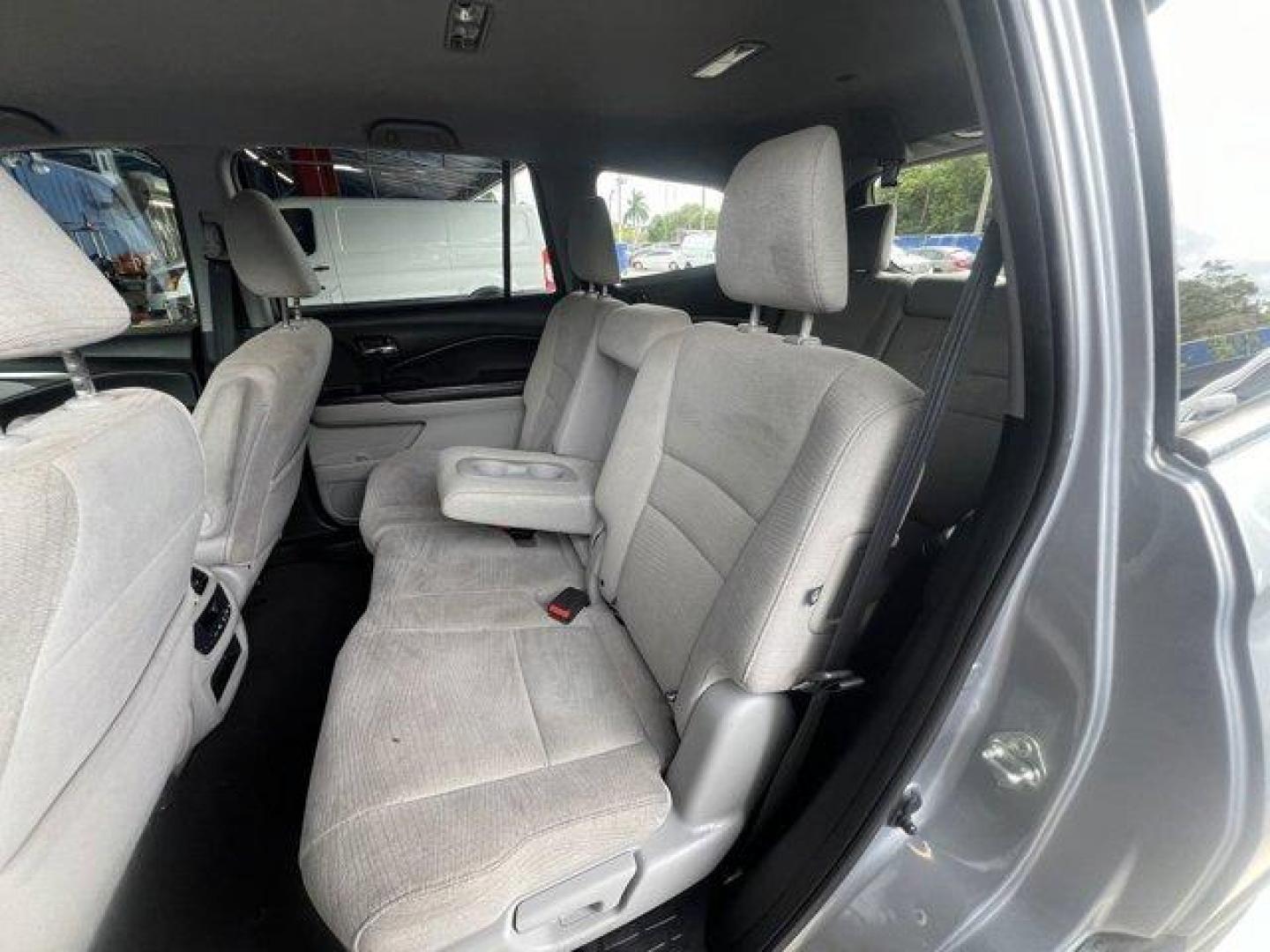 2017 Silver Honda Pilot (5FNYF5H36HB) with an 6 3.5 L engine, Automatic transmission, located at 27610 S Dixie Hwy, Homestead, FL, 33032, (305) 749-2348, 25.510241, -80.438301 - IIHS Top Safety Pick+. Boasts 27 Highway MPG and 19 City MPG! This Honda Pilot delivers a Regular Unleaded V-6 3.5 L/212 engine powering this Automatic transmission. Window Grid Antenna, Wheels: 18 Alloy, Wheels w/Machined Accents.* This Honda Pilot Features the Following Options *VSA Electronic Sta - Photo#12