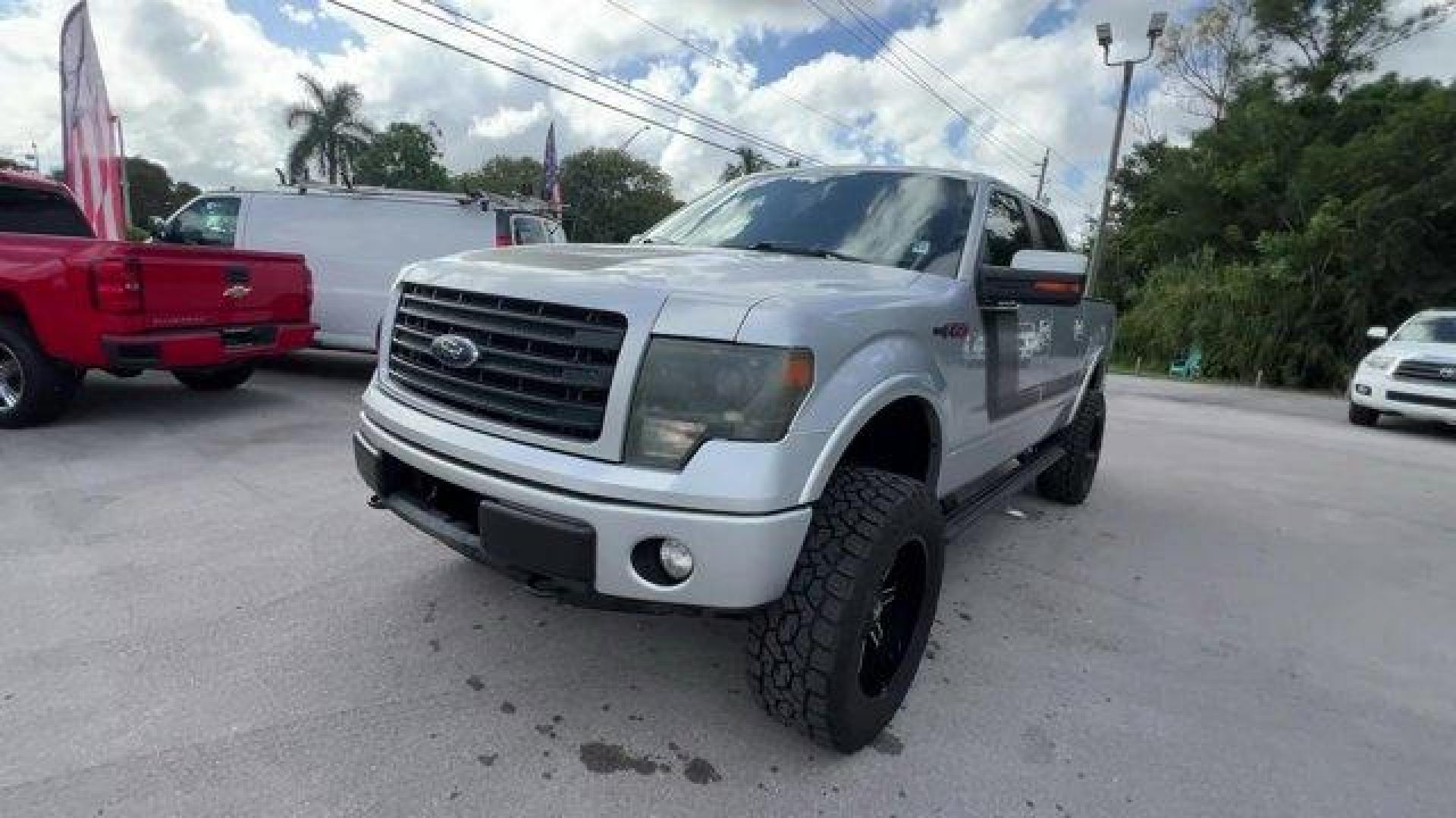 2014 Silver Ford F-150 (1FTFW1EF1EF) with an 8 5.0 L engine, Automatic transmission, located at 27610 S Dixie Hwy, Homestead, FL, 33032, (305) 749-2348, 25.510241, -80.438301 - KBB.com Brand Image Awards. Delivers 19 Highway MPG and 14 City MPG! This Ford F-150 boasts a Regular Unleaded V-8 5.0 L/302 engine powering this Automatic transmission. Transmission: Electronic 6-Speed Automatic -inc: tow/haul mode, Trailer Wiring Harness, Tailgate Rear Cargo Access.* This Ford F-1 - Photo#0