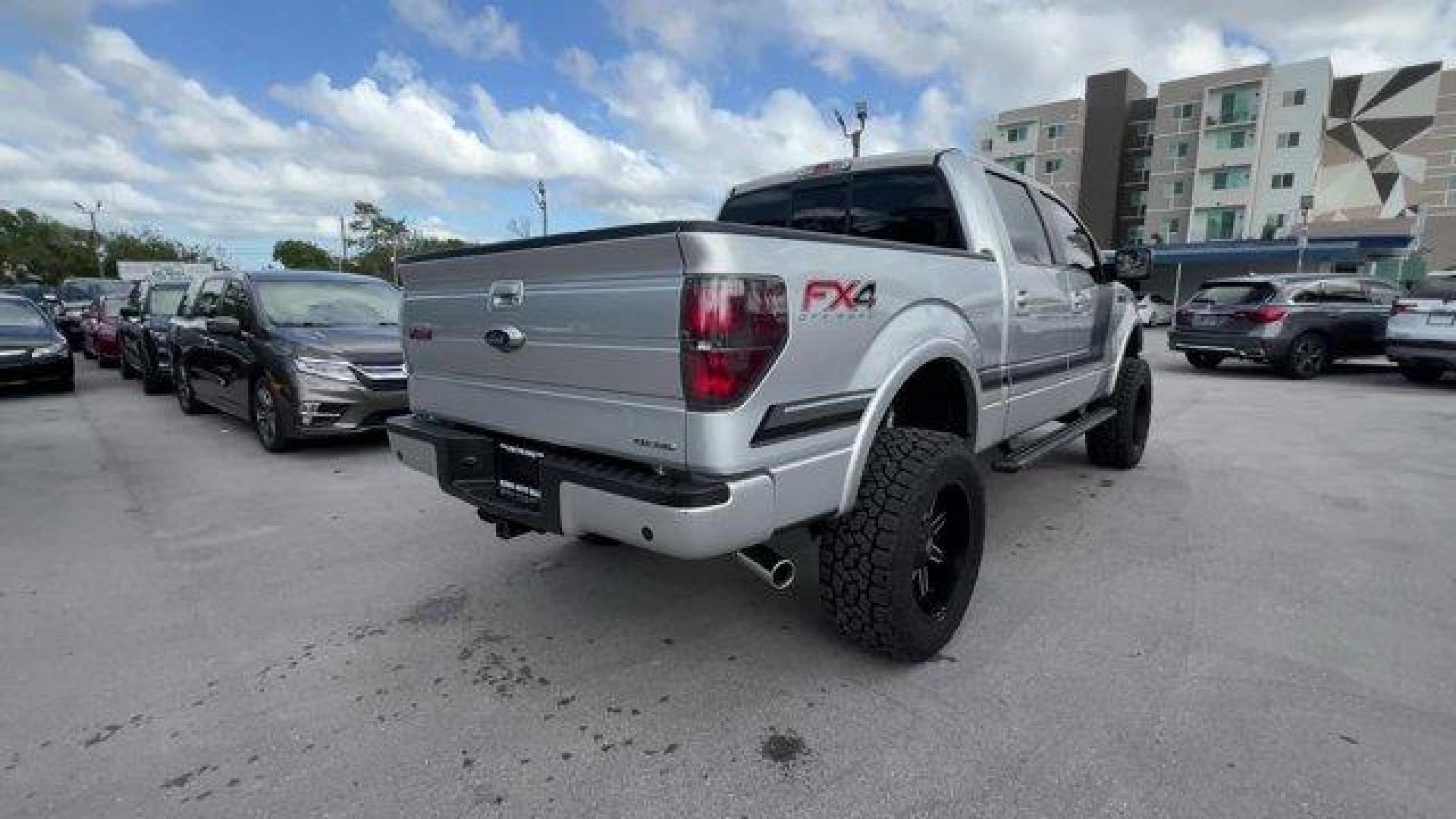 2014 Silver Ford F-150 (1FTFW1EF1EF) with an 8 5.0 L engine, Automatic transmission, located at 27610 S Dixie Hwy, Homestead, FL, 33032, (305) 749-2348, 25.510241, -80.438301 - KBB.com Brand Image Awards. Delivers 19 Highway MPG and 14 City MPG! This Ford F-150 boasts a Regular Unleaded V-8 5.0 L/302 engine powering this Automatic transmission. Transmission: Electronic 6-Speed Automatic -inc: tow/haul mode, Trailer Wiring Harness, Tailgate Rear Cargo Access.* This Ford F-1 - Photo#4