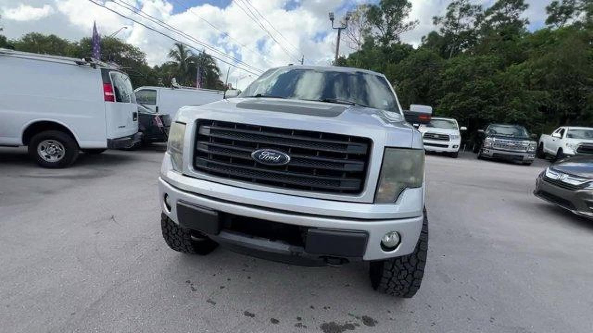 2014 Silver Ford F-150 (1FTFW1EF1EF) with an 8 5.0 L engine, Automatic transmission, located at 27610 S Dixie Hwy, Homestead, FL, 33032, (305) 749-2348, 25.510241, -80.438301 - KBB.com Brand Image Awards. Delivers 19 Highway MPG and 14 City MPG! This Ford F-150 boasts a Regular Unleaded V-8 5.0 L/302 engine powering this Automatic transmission. Transmission: Electronic 6-Speed Automatic -inc: tow/haul mode, Trailer Wiring Harness, Tailgate Rear Cargo Access.* This Ford F-1 - Photo#7