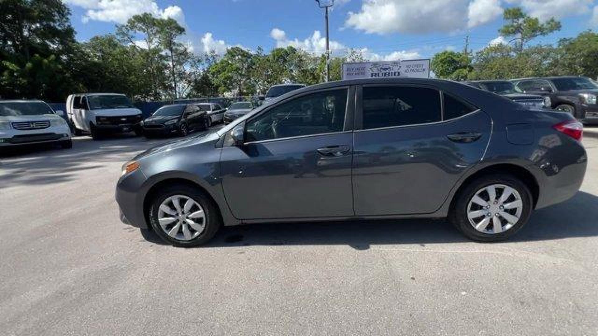 2014 Gray Toyota Corolla (2T1BURHE9EC) with an 4 1.8 L engine, Automatic transmission, located at 27610 S Dixie Hwy, Homestead, FL, 33032, (305) 749-2348, 25.510241, -80.438301 - KBB.com 10 Tech-Savviest Cars Under $20,000. This Toyota Corolla delivers a Regular Unleaded I-4 1.8 L/110 engine powering this Automatic transmission. Window Grid Antenna, Urethane Gear Shifter Material, Trunk Rear Cargo Access.*This Toyota Corolla Comes Equipped with These Options *Trip Computer, - Photo#0