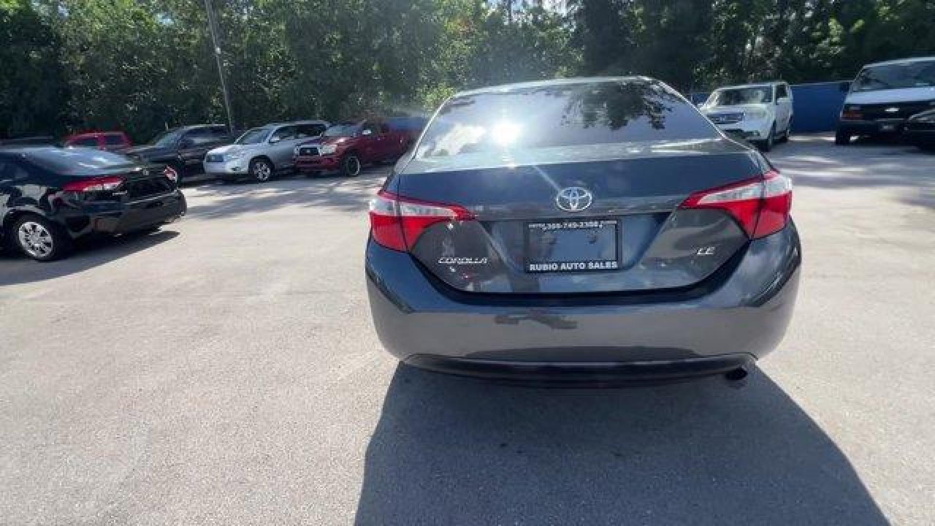 2014 Gray Toyota Corolla (2T1BURHE9EC) with an 4 1.8 L engine, Automatic transmission, located at 27610 S Dixie Hwy, Homestead, FL, 33032, (305) 749-2348, 25.510241, -80.438301 - KBB.com 10 Tech-Savviest Cars Under $20,000. This Toyota Corolla delivers a Regular Unleaded I-4 1.8 L/110 engine powering this Automatic transmission. Window Grid Antenna, Urethane Gear Shifter Material, Trunk Rear Cargo Access.*This Toyota Corolla Comes Equipped with These Options *Trip Computer, - Photo#2