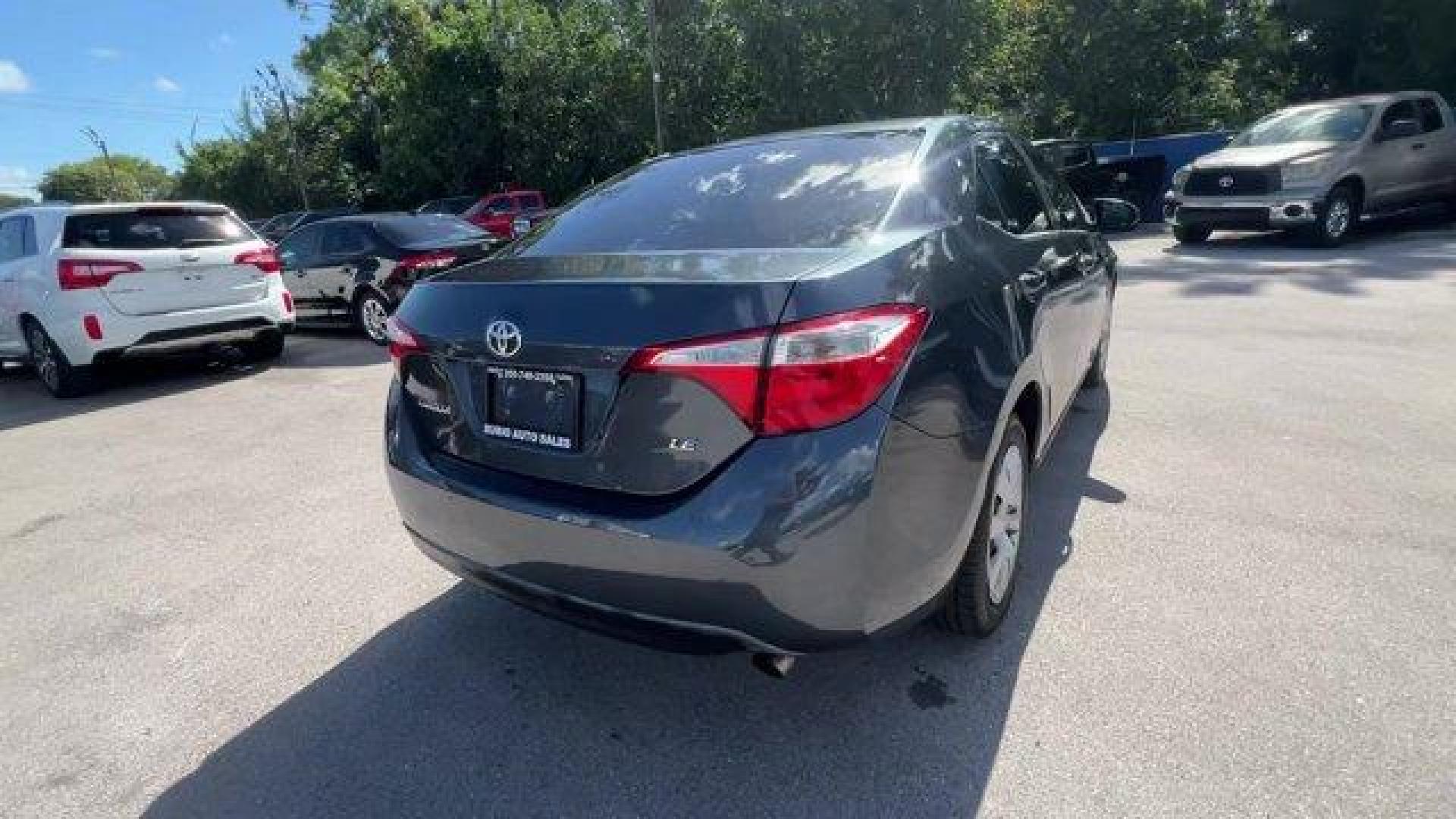 2014 Gray Toyota Corolla (2T1BURHE9EC) with an 4 1.8 L engine, Automatic transmission, located at 27610 S Dixie Hwy, Homestead, FL, 33032, (305) 749-2348, 25.510241, -80.438301 - KBB.com 10 Tech-Savviest Cars Under $20,000. This Toyota Corolla delivers a Regular Unleaded I-4 1.8 L/110 engine powering this Automatic transmission. Window Grid Antenna, Urethane Gear Shifter Material, Trunk Rear Cargo Access.*This Toyota Corolla Comes Equipped with These Options *Trip Computer, - Photo#3