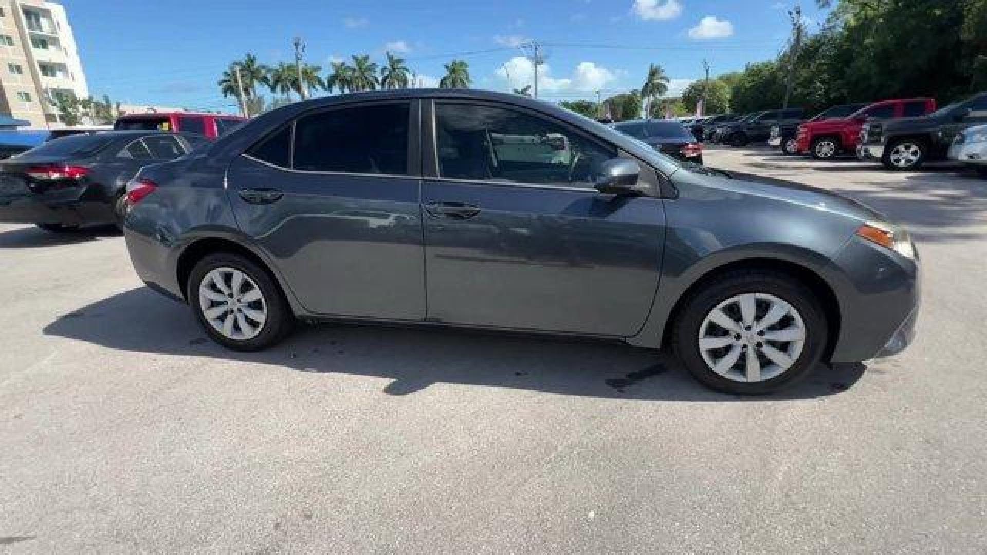 2014 Gray Toyota Corolla (2T1BURHE9EC) with an 4 1.8 L engine, Automatic transmission, located at 27610 S Dixie Hwy, Homestead, FL, 33032, (305) 749-2348, 25.510241, -80.438301 - KBB.com 10 Tech-Savviest Cars Under $20,000. This Toyota Corolla delivers a Regular Unleaded I-4 1.8 L/110 engine powering this Automatic transmission. Window Grid Antenna, Urethane Gear Shifter Material, Trunk Rear Cargo Access.*This Toyota Corolla Comes Equipped with These Options *Trip Computer, - Photo#4