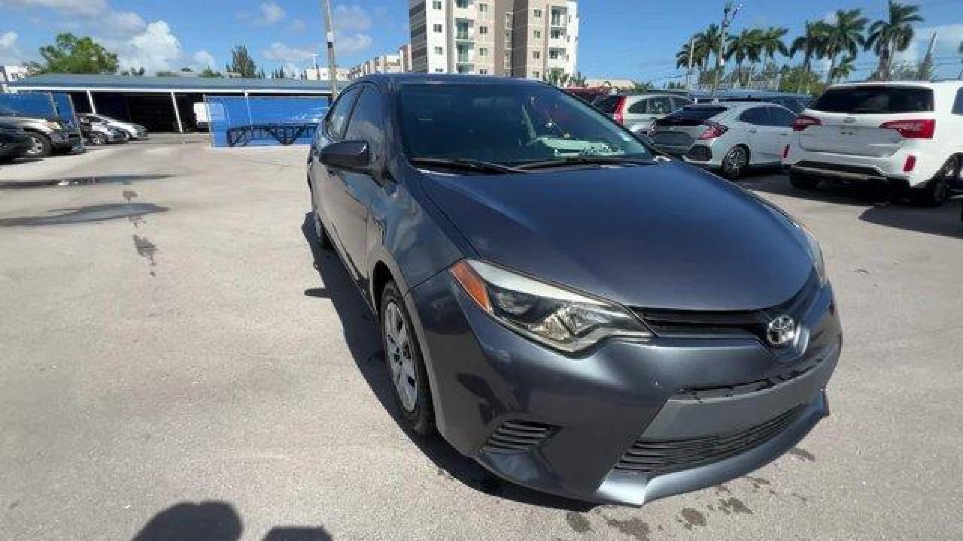 2014 Gray Toyota Corolla (2T1BURHE9EC) with an 4 1.8 L engine, Automatic transmission, located at 27610 S Dixie Hwy, Homestead, FL, 33032, (305) 749-2348, 25.510241, -80.438301 - KBB.com 10 Tech-Savviest Cars Under $20,000. This Toyota Corolla delivers a Regular Unleaded I-4 1.8 L/110 engine powering this Automatic transmission. Window Grid Antenna, Urethane Gear Shifter Material, Trunk Rear Cargo Access.*This Toyota Corolla Comes Equipped with These Options *Trip Computer, - Photo#5