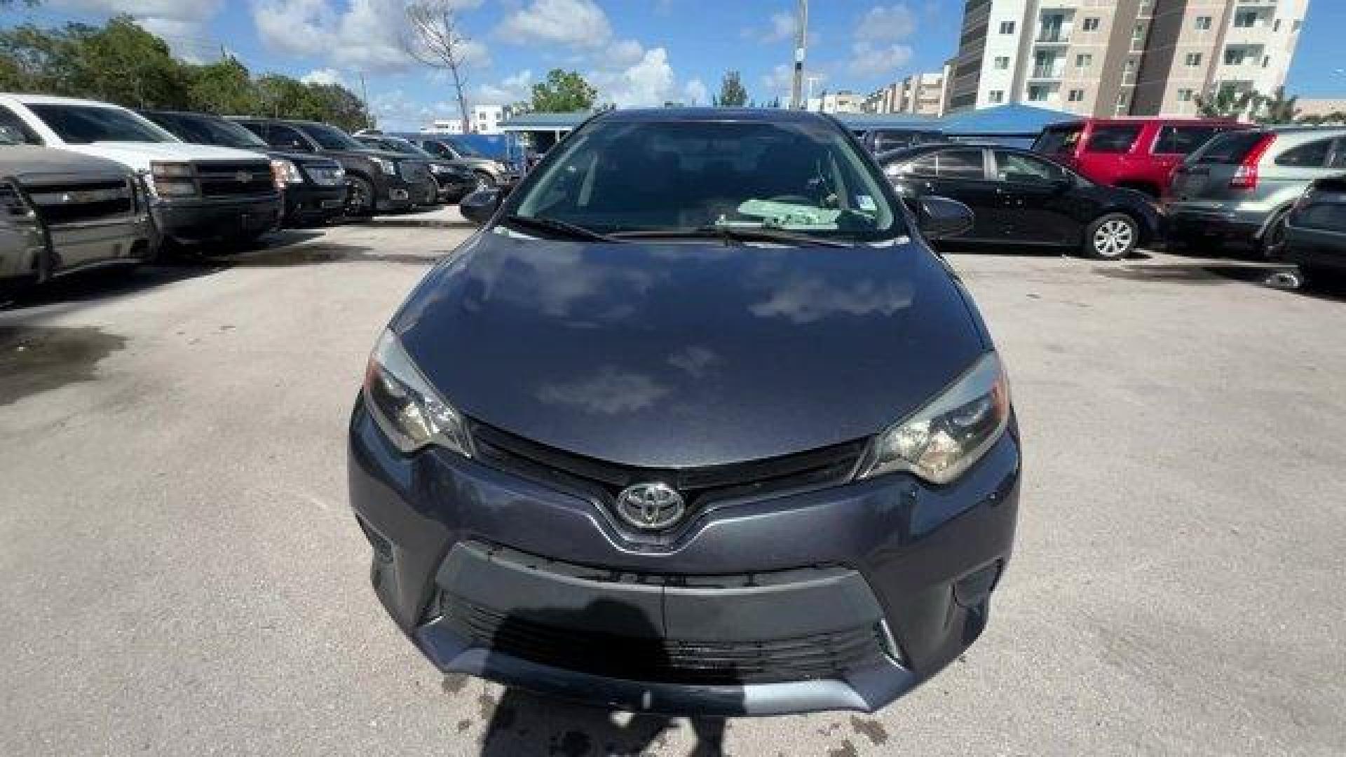 2014 Gray Toyota Corolla (2T1BURHE9EC) with an 4 1.8 L engine, Automatic transmission, located at 27610 S Dixie Hwy, Homestead, FL, 33032, (305) 749-2348, 25.510241, -80.438301 - KBB.com 10 Tech-Savviest Cars Under $20,000. This Toyota Corolla delivers a Regular Unleaded I-4 1.8 L/110 engine powering this Automatic transmission. Window Grid Antenna, Urethane Gear Shifter Material, Trunk Rear Cargo Access.*This Toyota Corolla Comes Equipped with These Options *Trip Computer, - Photo#6