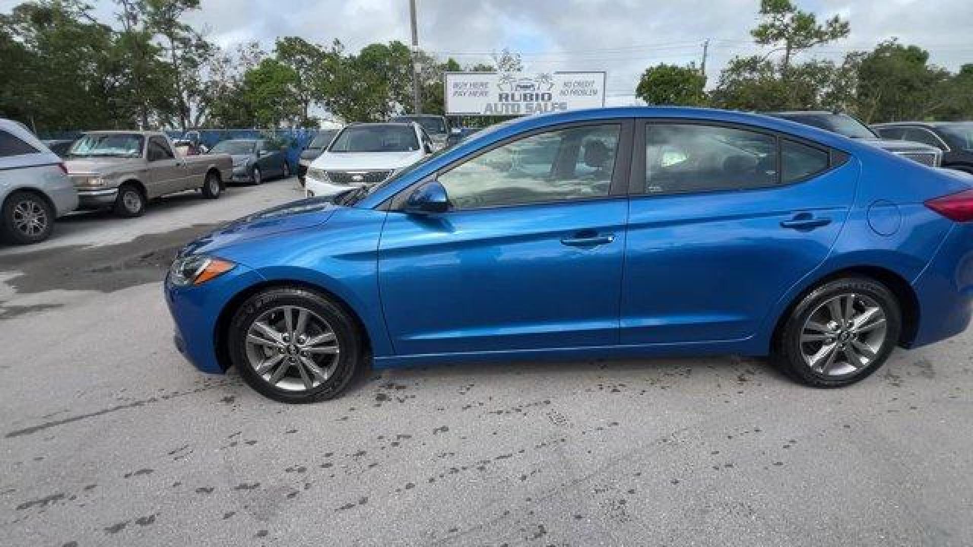 2018 Electric Blue /Gray Hyundai Elantra (5NPD84LF6JH) with an 4 2.0 L engine, Automatic transmission, located at 27610 S Dixie Hwy, Homestead, FL, 33032, (305) 749-2348, 25.510241, -80.438301 - KBB.com 10 Best Sedans Under $25,000. Only 59,682 Miles! Boasts 37 Highway MPG and 28 City MPG! This Hyundai Elantra boasts a Regular Unleaded I-4 2.0 L/122 engine powering this Automatic transmission. OPTION GROUP 01, GRAY, CLOTH SEAT TRIM, ELECTRIC BLUE.* This Hyundai Elantra Features the Followin - Photo#1