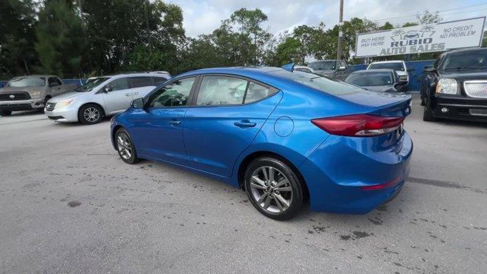 2018 Electric Blue /Gray Hyundai Elantra (5NPD84LF6JH) with an 4 2.0 L engine, Automatic transmission, located at 27610 S Dixie Hwy, Homestead, FL, 33032, (305) 749-2348, 25.510241, -80.438301 - KBB.com 10 Best Sedans Under $25,000. Only 59,682 Miles! Boasts 37 Highway MPG and 28 City MPG! This Hyundai Elantra boasts a Regular Unleaded I-4 2.0 L/122 engine powering this Automatic transmission. OPTION GROUP 01, GRAY, CLOTH SEAT TRIM, ELECTRIC BLUE.* This Hyundai Elantra Features the Followin - Photo#2