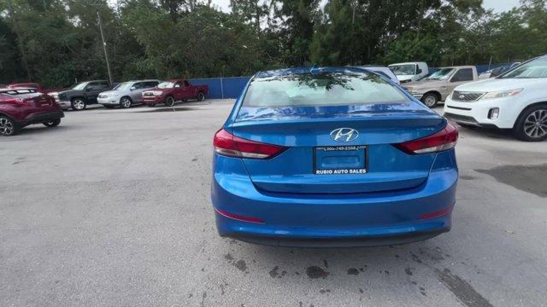 2018 Electric Blue /Gray Hyundai Elantra (5NPD84LF6JH) with an 4 2.0 L engine, Automatic transmission, located at 27610 S Dixie Hwy, Homestead, FL, 33032, (305) 749-2348, 25.510241, -80.438301 - KBB.com 10 Best Sedans Under $25,000. Only 59,682 Miles! Boasts 37 Highway MPG and 28 City MPG! This Hyundai Elantra boasts a Regular Unleaded I-4 2.0 L/122 engine powering this Automatic transmission. OPTION GROUP 01, GRAY, CLOTH SEAT TRIM, ELECTRIC BLUE.* This Hyundai Elantra Features the Followin - Photo#3