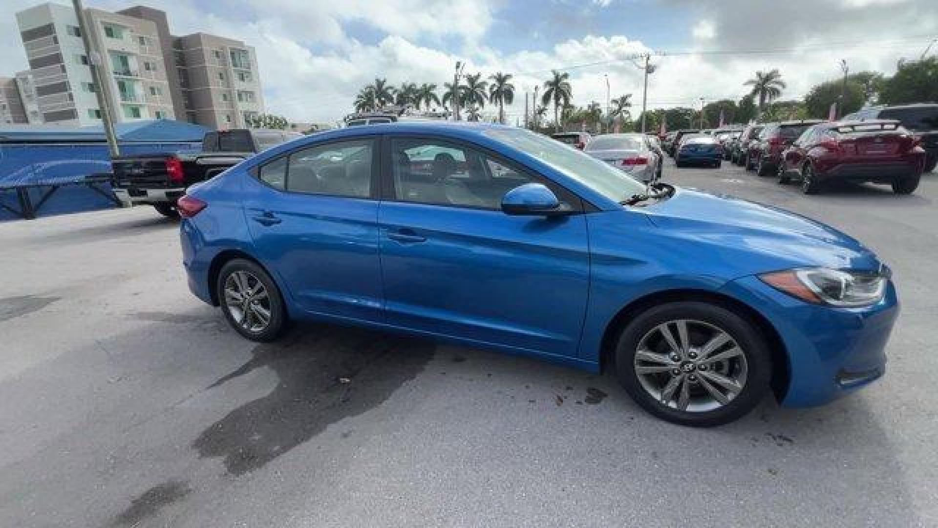 2018 Electric Blue /Gray Hyundai Elantra (5NPD84LF6JH) with an 4 2.0 L engine, Automatic transmission, located at 27610 S Dixie Hwy, Homestead, FL, 33032, (305) 749-2348, 25.510241, -80.438301 - KBB.com 10 Best Sedans Under $25,000. Only 59,682 Miles! Boasts 37 Highway MPG and 28 City MPG! This Hyundai Elantra boasts a Regular Unleaded I-4 2.0 L/122 engine powering this Automatic transmission. OPTION GROUP 01, GRAY, CLOTH SEAT TRIM, ELECTRIC BLUE.* This Hyundai Elantra Features the Followin - Photo#5