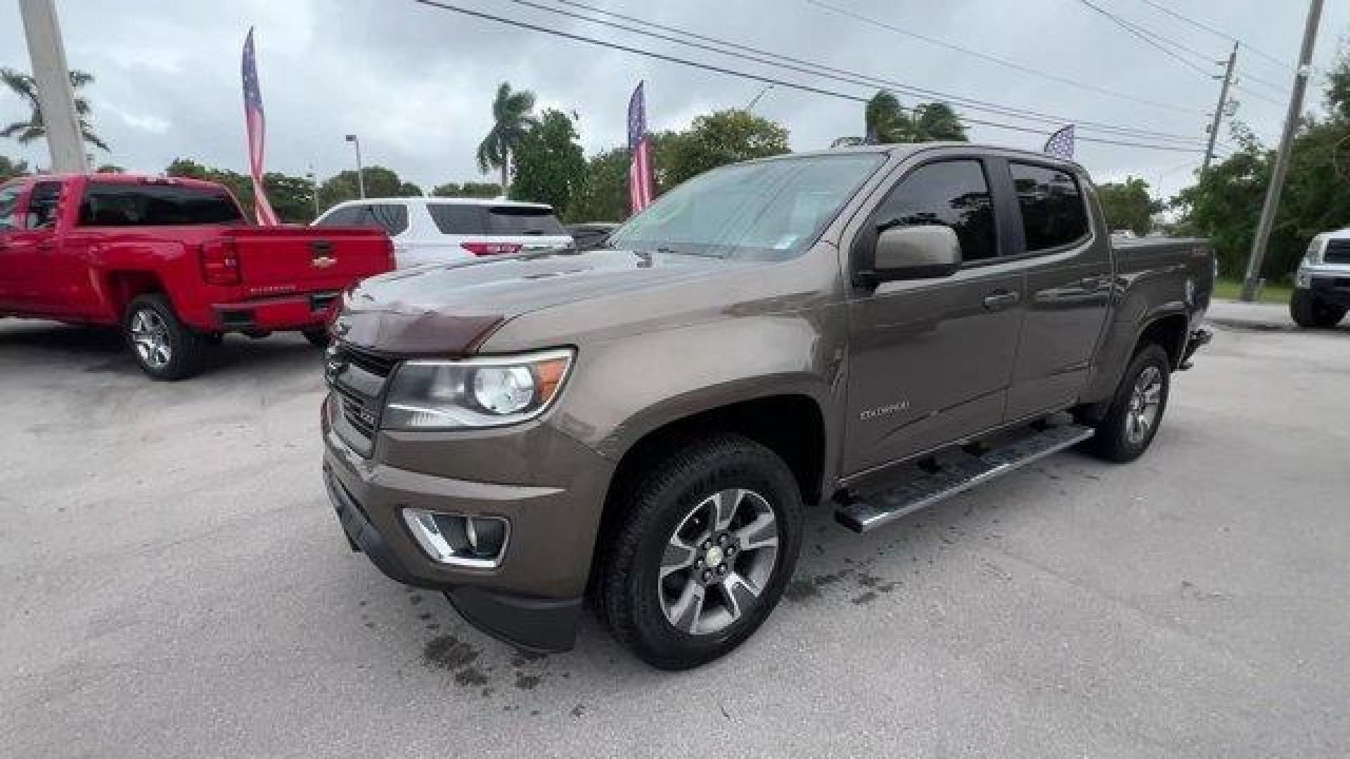 2016 Brownstone Metallic /Jet Black Chevrolet Colorado (1GCGSDE3XG1) with an 6 3.6L engine, Automatic transmission, located at 27610 S Dixie Hwy, Homestead, FL, 33032, (305) 749-2348, 25.510241, -80.438301 - KBB.com Best Buy Awards Finalist. Boasts 26 Highway MPG and 18 City MPG! This Chevrolet Colorado delivers a Gas V6 3.6L/217 engine powering this Automatic transmission. Z71 PREFERRED EQUIPMENT GROUP includes standard equipment, TRANSMISSION, 6-SPEED AUTOMATIC, HMD, 6L50 (STD), TRAILERING PACKAGE, HE - Photo#0