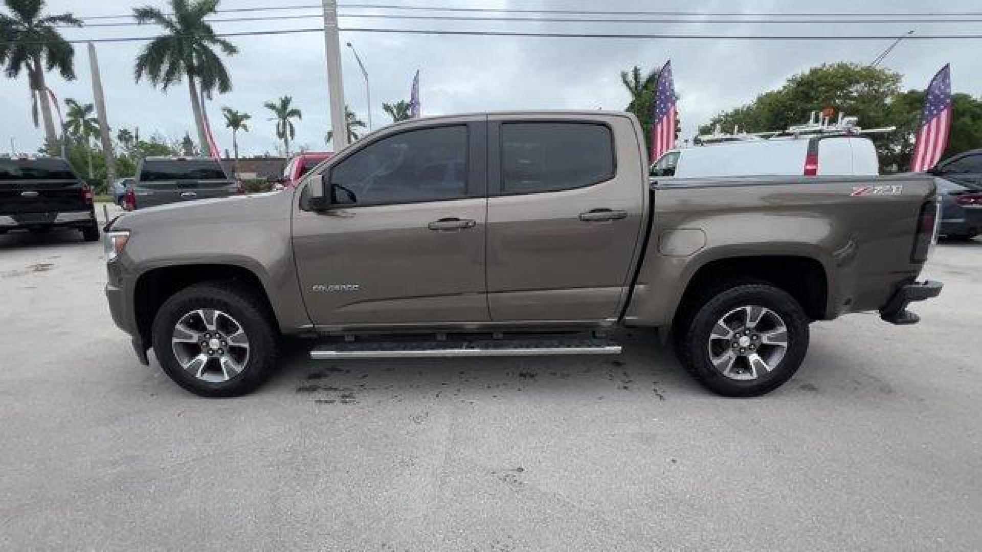 2016 Brownstone Metallic /Jet Black Chevrolet Colorado (1GCGSDE3XG1) with an 6 3.6L engine, Automatic transmission, located at 27610 S Dixie Hwy, Homestead, FL, 33032, (305) 749-2348, 25.510241, -80.438301 - KBB.com Best Buy Awards Finalist. Boasts 26 Highway MPG and 18 City MPG! This Chevrolet Colorado delivers a Gas V6 3.6L/217 engine powering this Automatic transmission. Z71 PREFERRED EQUIPMENT GROUP includes standard equipment, TRANSMISSION, 6-SPEED AUTOMATIC, HMD, 6L50 (STD), TRAILERING PACKAGE, HE - Photo#1