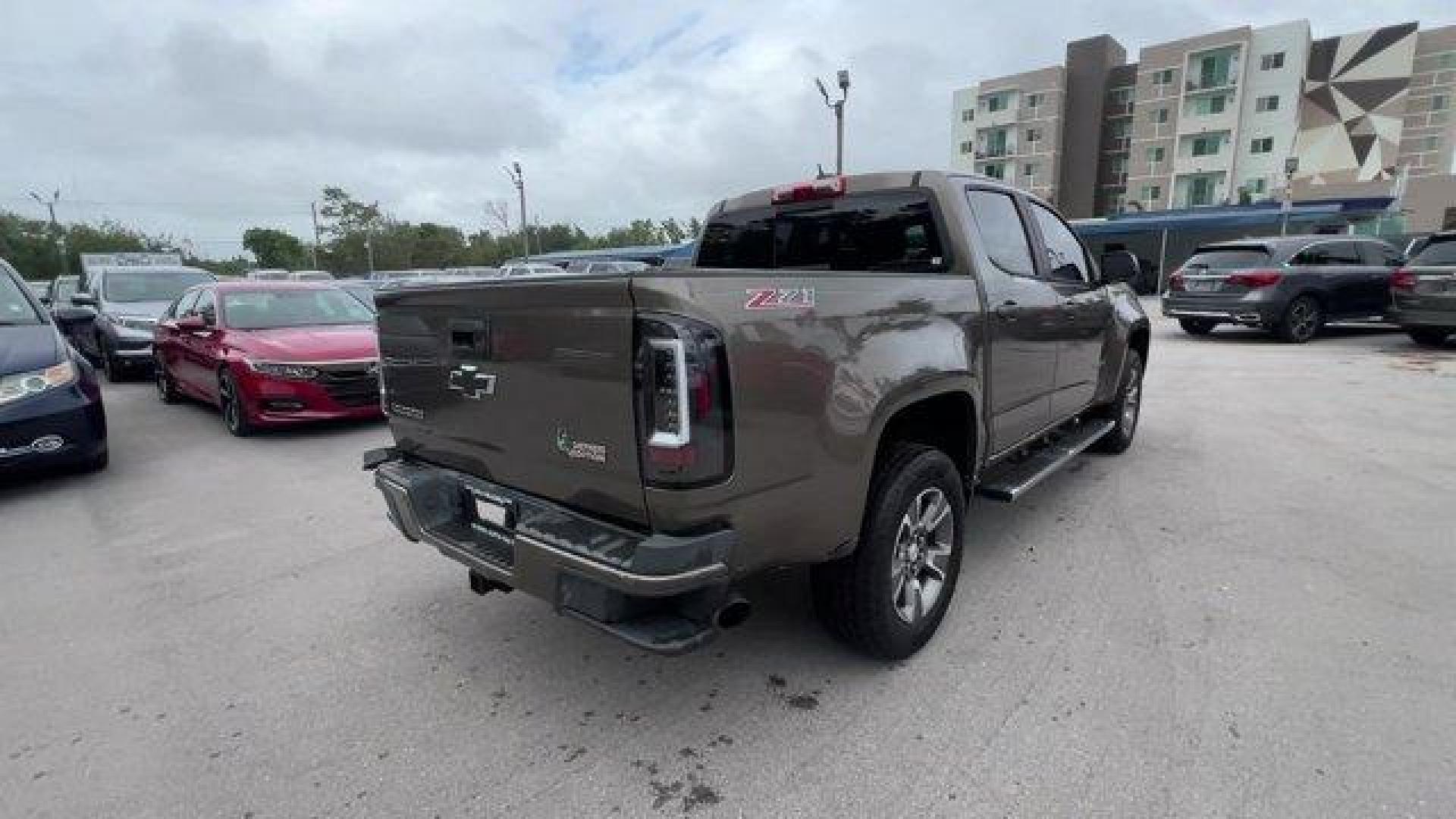 2016 Brownstone Metallic /Jet Black Chevrolet Colorado (1GCGSDE3XG1) with an 6 3.6L engine, Automatic transmission, located at 27610 S Dixie Hwy, Homestead, FL, 33032, (305) 749-2348, 25.510241, -80.438301 - KBB.com Best Buy Awards Finalist. Boasts 26 Highway MPG and 18 City MPG! This Chevrolet Colorado delivers a Gas V6 3.6L/217 engine powering this Automatic transmission. Z71 PREFERRED EQUIPMENT GROUP includes standard equipment, TRANSMISSION, 6-SPEED AUTOMATIC, HMD, 6L50 (STD), TRAILERING PACKAGE, HE - Photo#4