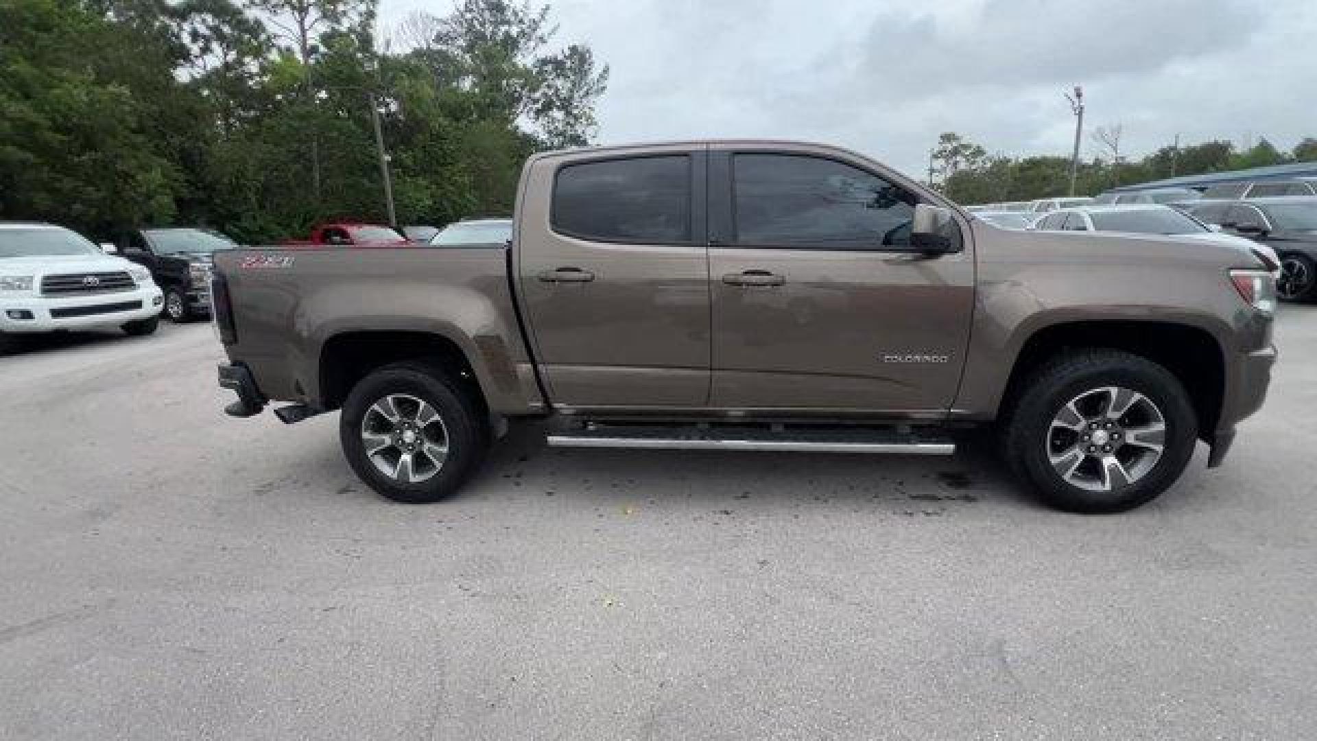 2016 Brownstone Metallic /Jet Black Chevrolet Colorado (1GCGSDE3XG1) with an 6 3.6L engine, Automatic transmission, located at 27610 S Dixie Hwy, Homestead, FL, 33032, (305) 749-2348, 25.510241, -80.438301 - KBB.com Best Buy Awards Finalist. Boasts 26 Highway MPG and 18 City MPG! This Chevrolet Colorado delivers a Gas V6 3.6L/217 engine powering this Automatic transmission. Z71 PREFERRED EQUIPMENT GROUP includes standard equipment, TRANSMISSION, 6-SPEED AUTOMATIC, HMD, 6L50 (STD), TRAILERING PACKAGE, HE - Photo#5