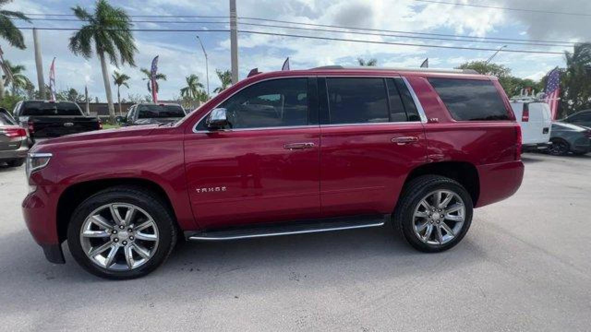 2015 Crystal Red Tintcoat /Cocoa/Dune Chevrolet Tahoe (1GNSCCKC8FR) with an 8 5.3L engine, Automatic transmission, located at 27610 S Dixie Hwy, Homestead, FL, 33032, (305) 749-2348, 25.510241, -80.438301 - KBB.com 15 Best Family Cars. Boasts 23 Highway MPG and 16 City MPG! This Chevrolet Tahoe boasts a Gas/Ethanol V8 5.3L/ engine powering this Automatic transmission. WHEELS, 22 (55.9 CM) PREMIUM PAINTED with chrome inserts, TRANSMISSION, 6-SPEED AUTOMATIC, ELECTRONICALLY CONTROLLED with overdrive and - Photo#1