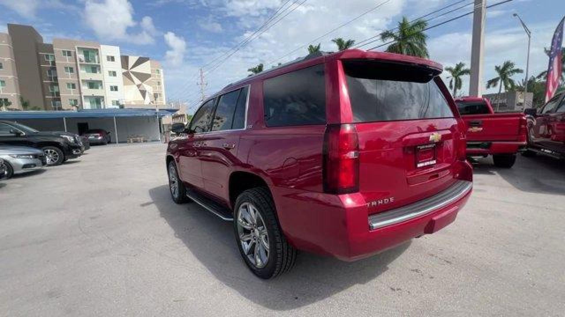 2015 Crystal Red Tintcoat /Cocoa/Dune Chevrolet Tahoe (1GNSCCKC8FR) with an 8 5.3L engine, Automatic transmission, located at 27610 S Dixie Hwy, Homestead, FL, 33032, (305) 749-2348, 25.510241, -80.438301 - KBB.com 15 Best Family Cars. Boasts 23 Highway MPG and 16 City MPG! This Chevrolet Tahoe boasts a Gas/Ethanol V8 5.3L/ engine powering this Automatic transmission. WHEELS, 22 (55.9 CM) PREMIUM PAINTED with chrome inserts, TRANSMISSION, 6-SPEED AUTOMATIC, ELECTRONICALLY CONTROLLED with overdrive and - Photo#2