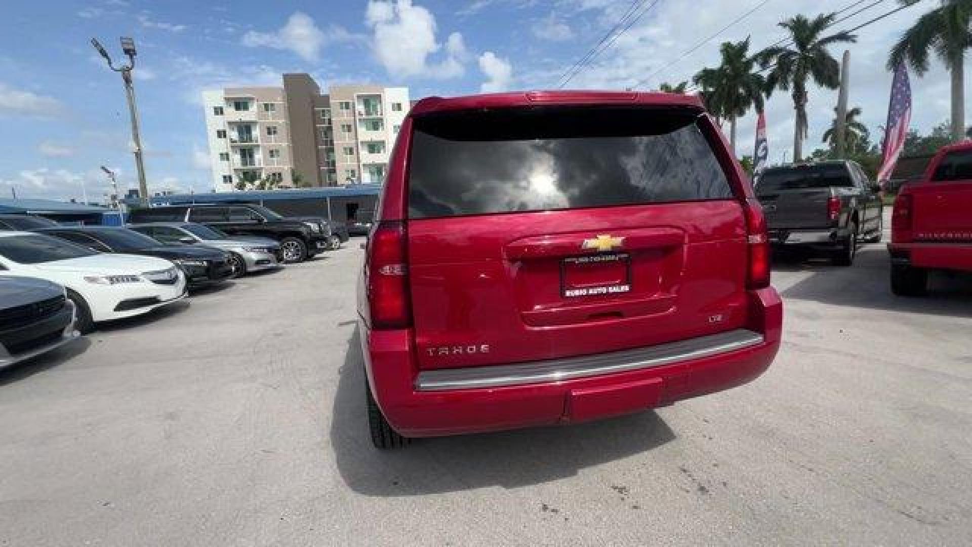 2015 Crystal Red Tintcoat /Cocoa/Dune Chevrolet Tahoe (1GNSCCKC8FR) with an 8 5.3L engine, Automatic transmission, located at 27610 S Dixie Hwy, Homestead, FL, 33032, (305) 749-2348, 25.510241, -80.438301 - KBB.com 15 Best Family Cars. Boasts 23 Highway MPG and 16 City MPG! This Chevrolet Tahoe boasts a Gas/Ethanol V8 5.3L/ engine powering this Automatic transmission. WHEELS, 22 (55.9 CM) PREMIUM PAINTED with chrome inserts, TRANSMISSION, 6-SPEED AUTOMATIC, ELECTRONICALLY CONTROLLED with overdrive and - Photo#3