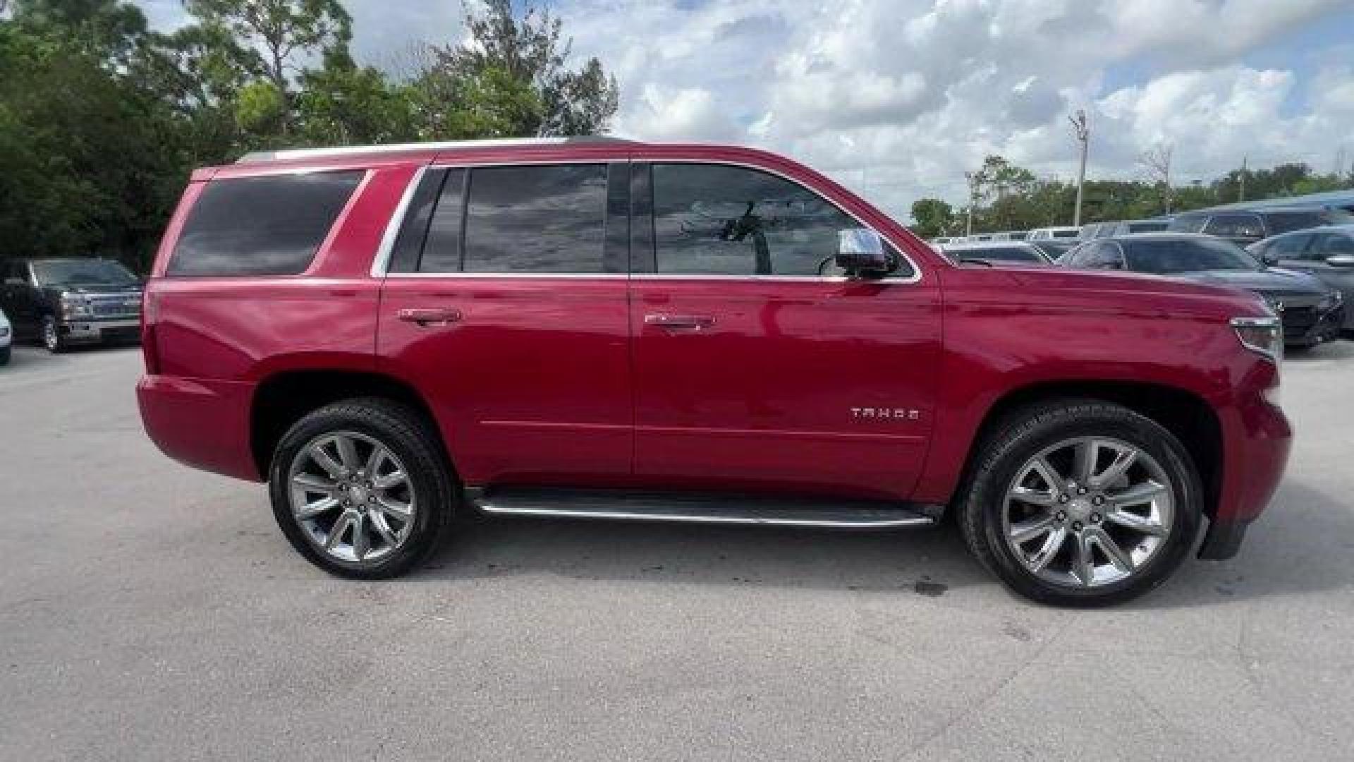 2015 Crystal Red Tintcoat /Cocoa/Dune Chevrolet Tahoe (1GNSCCKC8FR) with an 8 5.3L engine, Automatic transmission, located at 27610 S Dixie Hwy, Homestead, FL, 33032, (305) 749-2348, 25.510241, -80.438301 - KBB.com 15 Best Family Cars. Boasts 23 Highway MPG and 16 City MPG! This Chevrolet Tahoe boasts a Gas/Ethanol V8 5.3L/ engine powering this Automatic transmission. WHEELS, 22 (55.9 CM) PREMIUM PAINTED with chrome inserts, TRANSMISSION, 6-SPEED AUTOMATIC, ELECTRONICALLY CONTROLLED with overdrive and - Photo#5