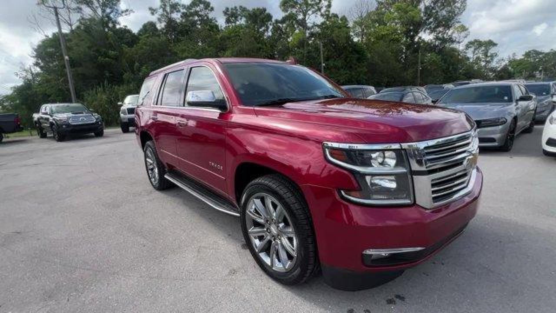 2015 Crystal Red Tintcoat /Cocoa/Dune Chevrolet Tahoe (1GNSCCKC8FR) with an 8 5.3L engine, Automatic transmission, located at 27610 S Dixie Hwy, Homestead, FL, 33032, (305) 749-2348, 25.510241, -80.438301 - KBB.com 15 Best Family Cars. Boasts 23 Highway MPG and 16 City MPG! This Chevrolet Tahoe boasts a Gas/Ethanol V8 5.3L/ engine powering this Automatic transmission. WHEELS, 22 (55.9 CM) PREMIUM PAINTED with chrome inserts, TRANSMISSION, 6-SPEED AUTOMATIC, ELECTRONICALLY CONTROLLED with overdrive and - Photo#6