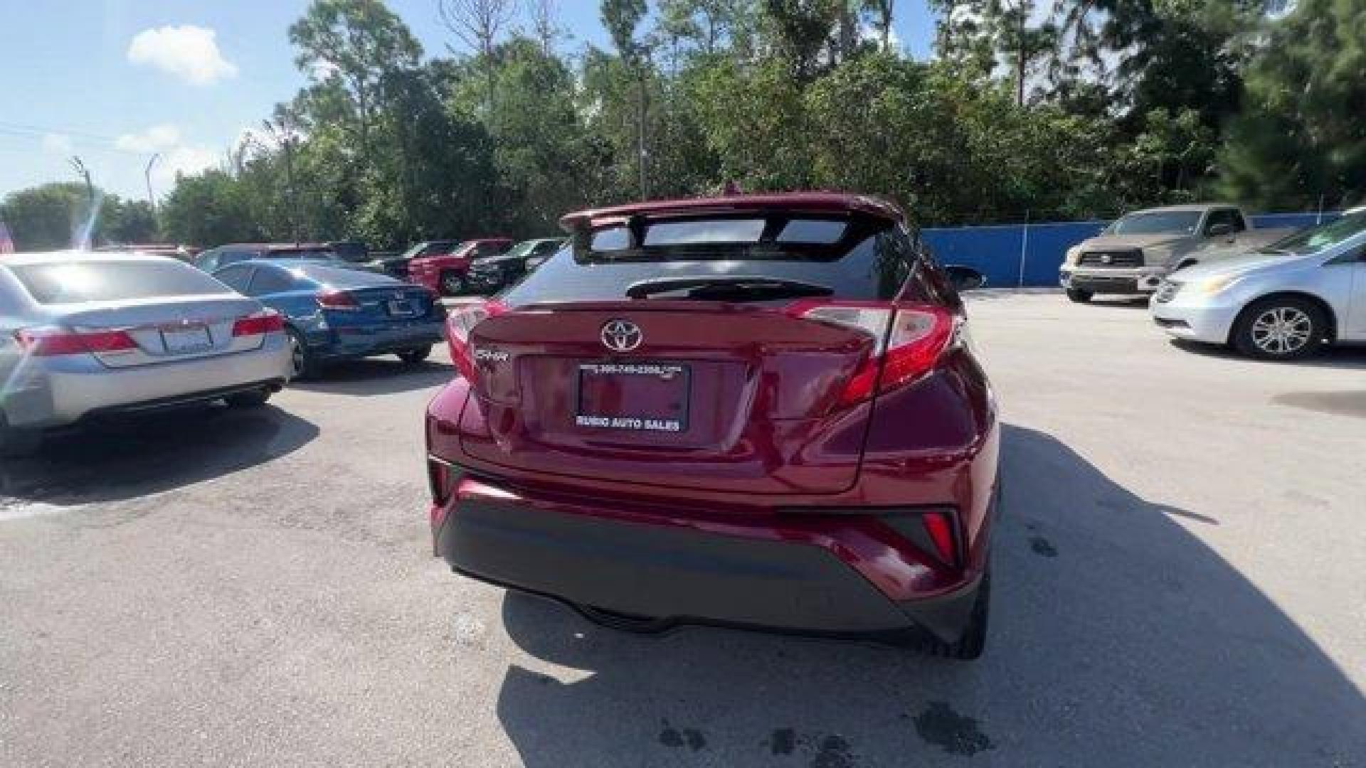 2019 Maroon Toyota C-HR (JTNKHMBX7K1) with an 4 2.0 L engine, Variable transmission, located at 27610 S Dixie Hwy, Homestead, FL, 33032, (305) 749-2348, 25.510241, -80.438301 - KBB.com Best Resale Value Awards. Delivers 31 Highway MPG and 27 City MPG! This Toyota C-HR delivers a Regular Unleaded I-4 2.0 L/121 engine powering this Variable transmission. Wing Spoiler, VSC Electronic Stability Control (ESC), Variable Intermittent Wipers.*This Toyota C-HR Comes Equipped with T - Photo#2