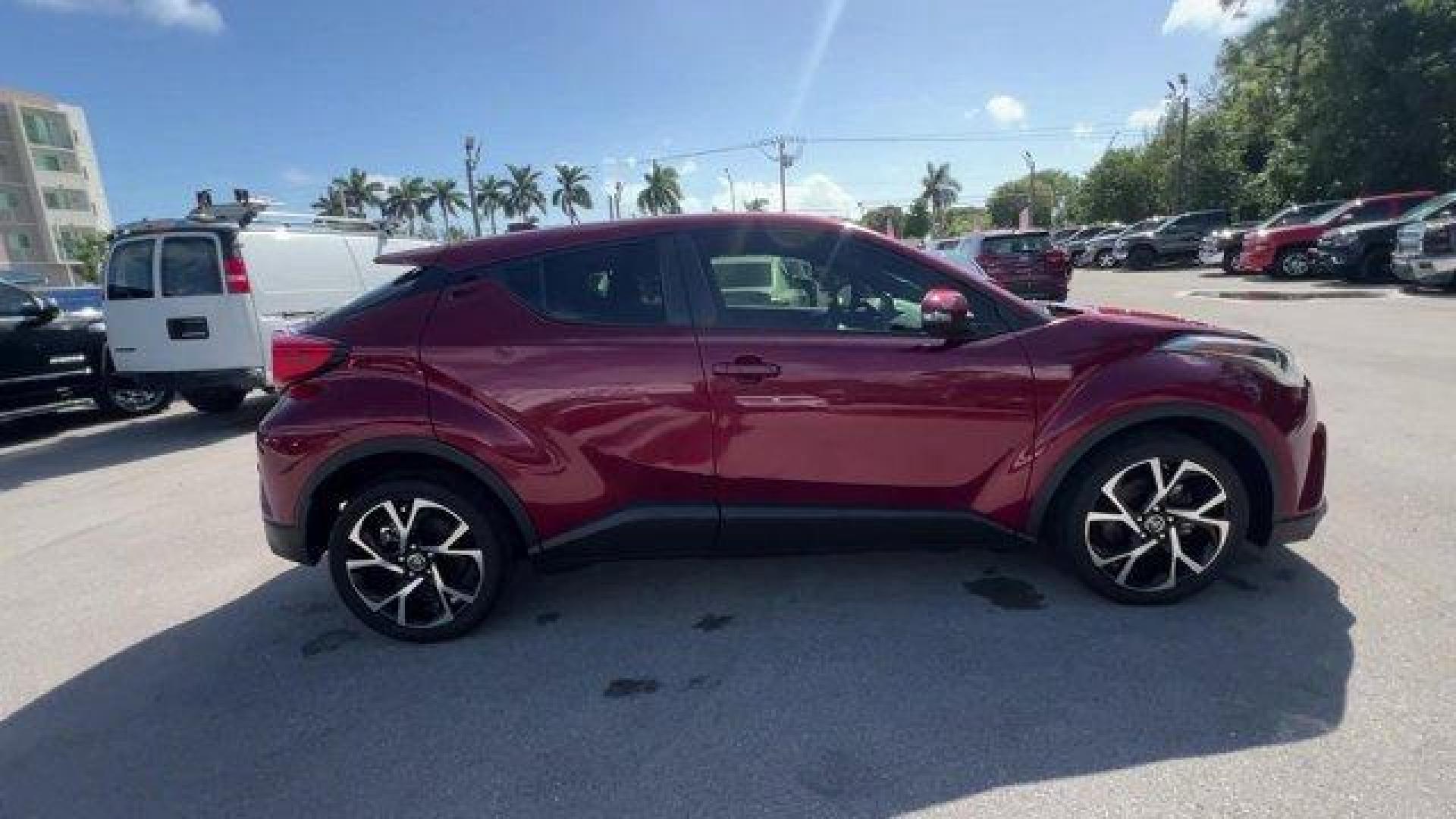 2019 Maroon Toyota C-HR (JTNKHMBX7K1) with an 4 2.0 L engine, Variable transmission, located at 27610 S Dixie Hwy, Homestead, FL, 33032, (305) 749-2348, 25.510241, -80.438301 - KBB.com Best Resale Value Awards. Delivers 31 Highway MPG and 27 City MPG! This Toyota C-HR delivers a Regular Unleaded I-4 2.0 L/121 engine powering this Variable transmission. Wing Spoiler, VSC Electronic Stability Control (ESC), Variable Intermittent Wipers.*This Toyota C-HR Comes Equipped with T - Photo#4