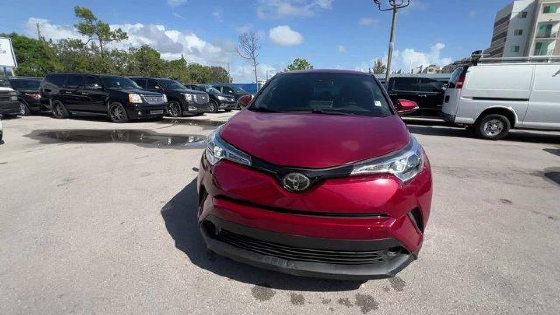 2019 Maroon Toyota C-HR (JTNKHMBX7K1) with an 4 2.0 L engine, Variable transmission, located at 27610 S Dixie Hwy, Homestead, FL, 33032, (305) 749-2348, 25.510241, -80.438301 - KBB.com Best Resale Value Awards. Delivers 31 Highway MPG and 27 City MPG! This Toyota C-HR delivers a Regular Unleaded I-4 2.0 L/121 engine powering this Variable transmission. Wing Spoiler, VSC Electronic Stability Control (ESC), Variable Intermittent Wipers.*This Toyota C-HR Comes Equipped with T - Photo#6