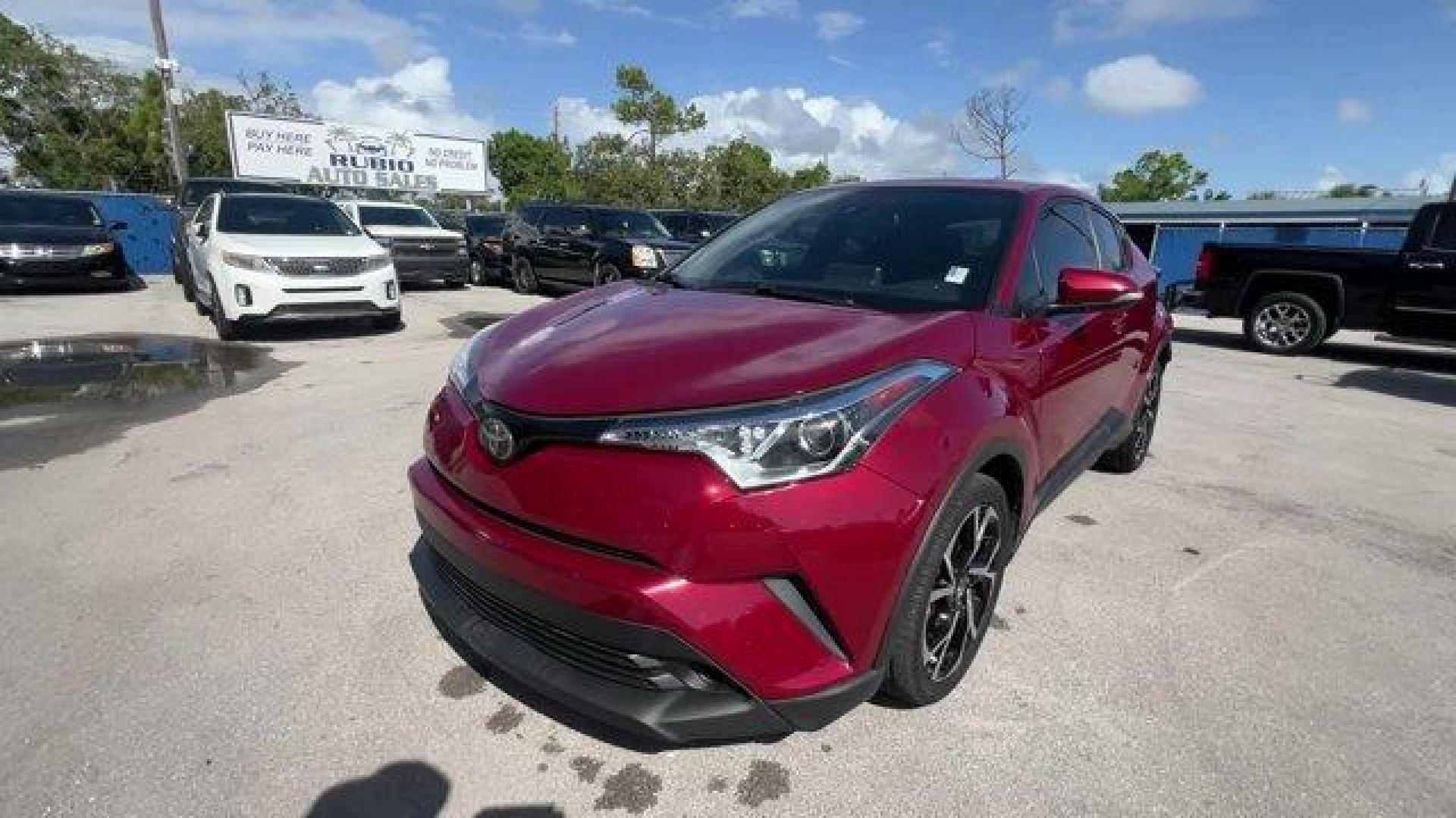 2019 Maroon Toyota C-HR (JTNKHMBX7K1) with an 4 2.0 L engine, Variable transmission, located at 27610 S Dixie Hwy, Homestead, FL, 33032, (305) 749-2348, 25.510241, -80.438301 - KBB.com Best Resale Value Awards. Delivers 31 Highway MPG and 27 City MPG! This Toyota C-HR delivers a Regular Unleaded I-4 2.0 L/121 engine powering this Variable transmission. Wing Spoiler, VSC Electronic Stability Control (ESC), Variable Intermittent Wipers.*This Toyota C-HR Comes Equipped with T - Photo#7