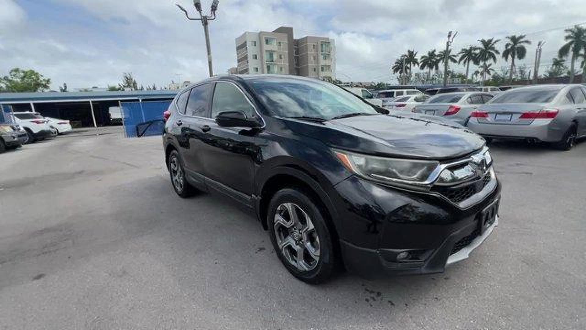 2017 Black Honda CR-V (2HKRW2H51HH) with an 4 1.5 L engine, Variable transmission, located at 27610 S Dixie Hwy, Homestead, FL, 33032, (305) 749-2348, 25.510241, -80.438301 - KBB.com 10 Most Awarded Brands. Scores 33 Highway MPG and 27 City MPG! This Honda CR-V boasts a Intercooled Turbo Regular Unleaded I-4 1.5 L/91 engine powering this Variable transmission. Wheels: 18 Alloy, Valet Function, Urethane Gear Shifter Material.* This Honda CR-V Features the Following Option - Photo#6