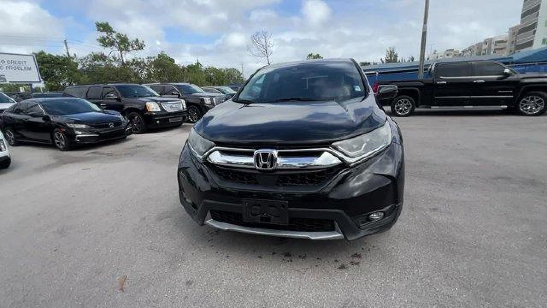 2017 Black Honda CR-V (2HKRW2H51HH) with an 4 1.5 L engine, Variable transmission, located at 27610 S Dixie Hwy, Homestead, FL, 33032, (305) 749-2348, 25.510241, -80.438301 - KBB.com 10 Most Awarded Brands. Scores 33 Highway MPG and 27 City MPG! This Honda CR-V boasts a Intercooled Turbo Regular Unleaded I-4 1.5 L/91 engine powering this Variable transmission. Wheels: 18 Alloy, Valet Function, Urethane Gear Shifter Material.* This Honda CR-V Features the Following Option - Photo#7