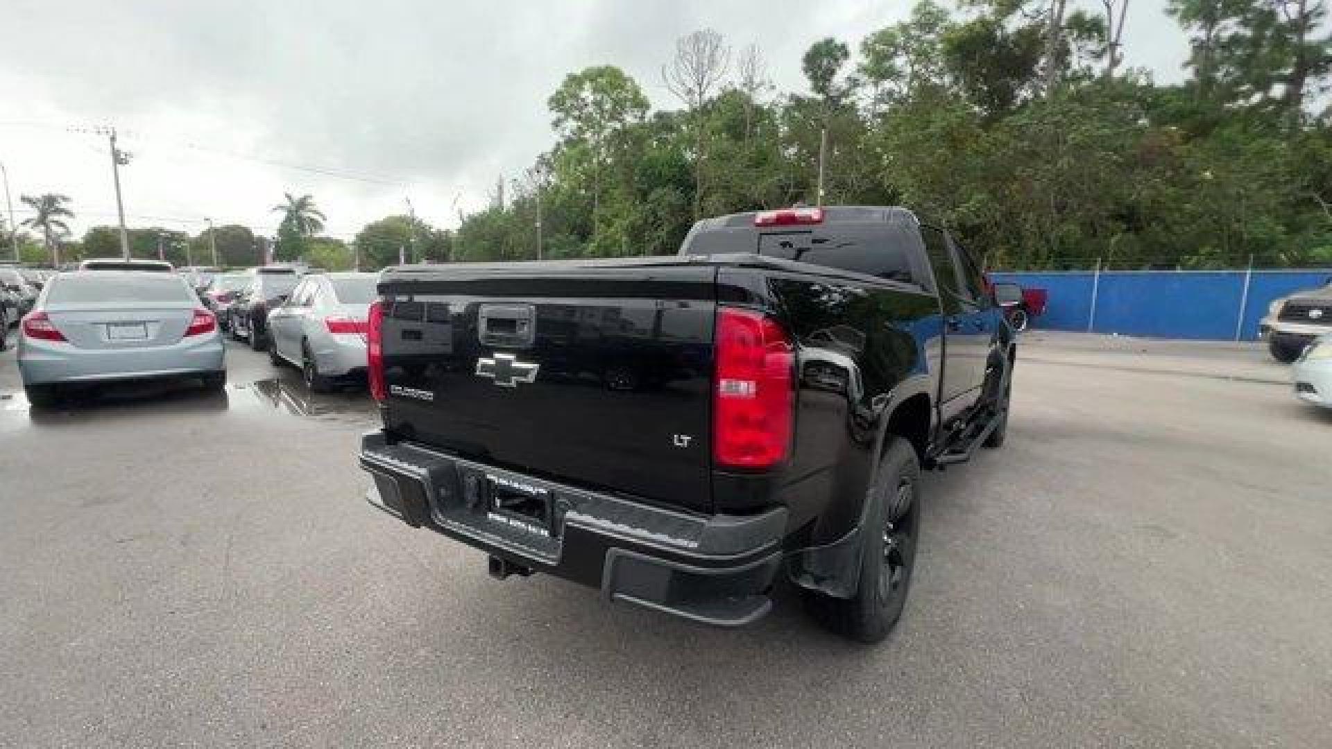 2016 Black /Jet Black Chevrolet Colorado (1GCGSCE32G1) with an 6 3.6L engine, Automatic transmission, located at 27610 S Dixie Hwy, Homestead, FL, 33032, (305) 749-2348, 25.510241, -80.438301 - KBB.com Best Resale Value Awards. Boasts 26 Highway MPG and 18 City MPG! This Chevrolet Colorado delivers a Gas V6 3.6L/217 engine powering this Automatic transmission. WINDOW, REAR-SLIDING, MANUAL, WHEELS, 18 X 8.5 (45.7 CM X 21.6 CM) DARK ARGENT METALLIC CAST ALUMINUM (Includes (QIA) P265/60R18 al - Photo#4