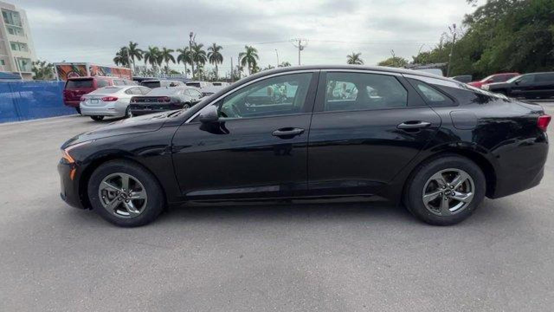 2021 Ebony Black /Black Kia K5 (5XXG14J28MG) with an 4 1.6 L engine, Automatic transmission, located at 27610 S Dixie Hwy, Homestead, FL, 33032, (305) 749-2348, 25.510241, -80.438301 - Delivers 37 Highway MPG and 27 City MPG! This Kia K5 delivers a Intercooled Turbo Regular Unleaded I-4 1.6 L/98 engine powering this Automatic transmission. EBONY BLACK, CARPETED FLOOR MATS, BLACK, CLOTH SEAT TRIM.*This Kia K5 Comes Equipped with These Options *Window Grid Antenna, Wheels: 6.5J x 16 - Photo#1