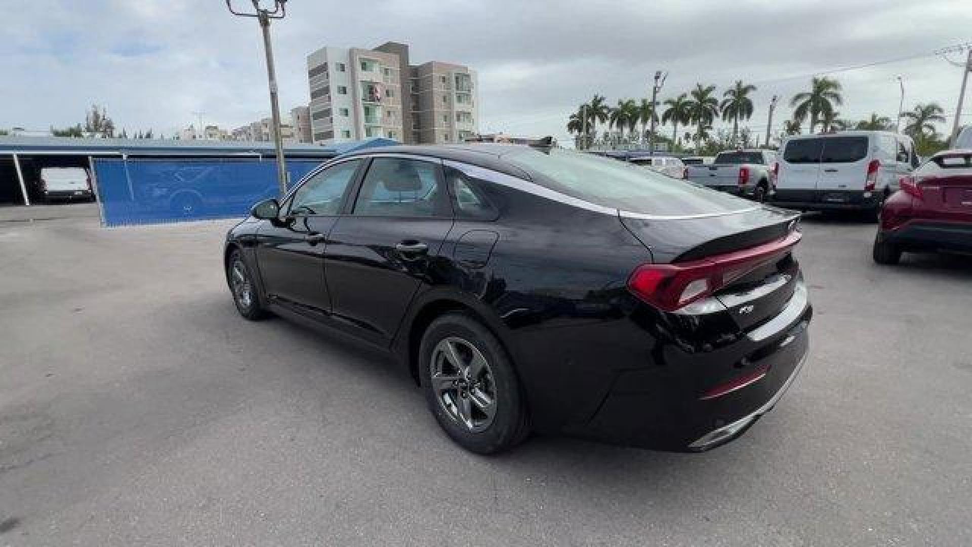 2021 Ebony Black /Black Kia K5 (5XXG14J28MG) with an 4 1.6 L engine, Automatic transmission, located at 27610 S Dixie Hwy, Homestead, FL, 33032, (305) 749-2348, 25.510241, -80.438301 - Delivers 37 Highway MPG and 27 City MPG! This Kia K5 delivers a Intercooled Turbo Regular Unleaded I-4 1.6 L/98 engine powering this Automatic transmission. EBONY BLACK, CARPETED FLOOR MATS, BLACK, CLOTH SEAT TRIM.*This Kia K5 Comes Equipped with These Options *Window Grid Antenna, Wheels: 6.5J x 16 - Photo#2