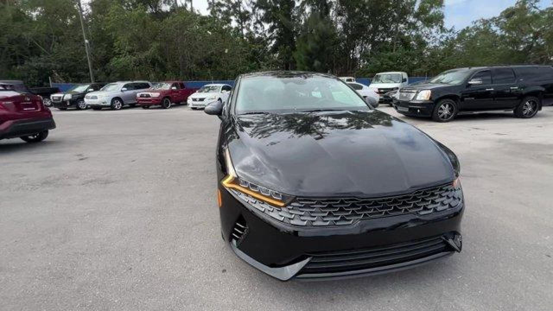 2021 Ebony Black /Black Kia K5 (5XXG14J28MG) with an 4 1.6 L engine, Automatic transmission, located at 27610 S Dixie Hwy, Homestead, FL, 33032, (305) 749-2348, 25.510241, -80.438301 - Delivers 37 Highway MPG and 27 City MPG! This Kia K5 delivers a Intercooled Turbo Regular Unleaded I-4 1.6 L/98 engine powering this Automatic transmission. EBONY BLACK, CARPETED FLOOR MATS, BLACK, CLOTH SEAT TRIM.*This Kia K5 Comes Equipped with These Options *Window Grid Antenna, Wheels: 6.5J x 16 - Photo#7