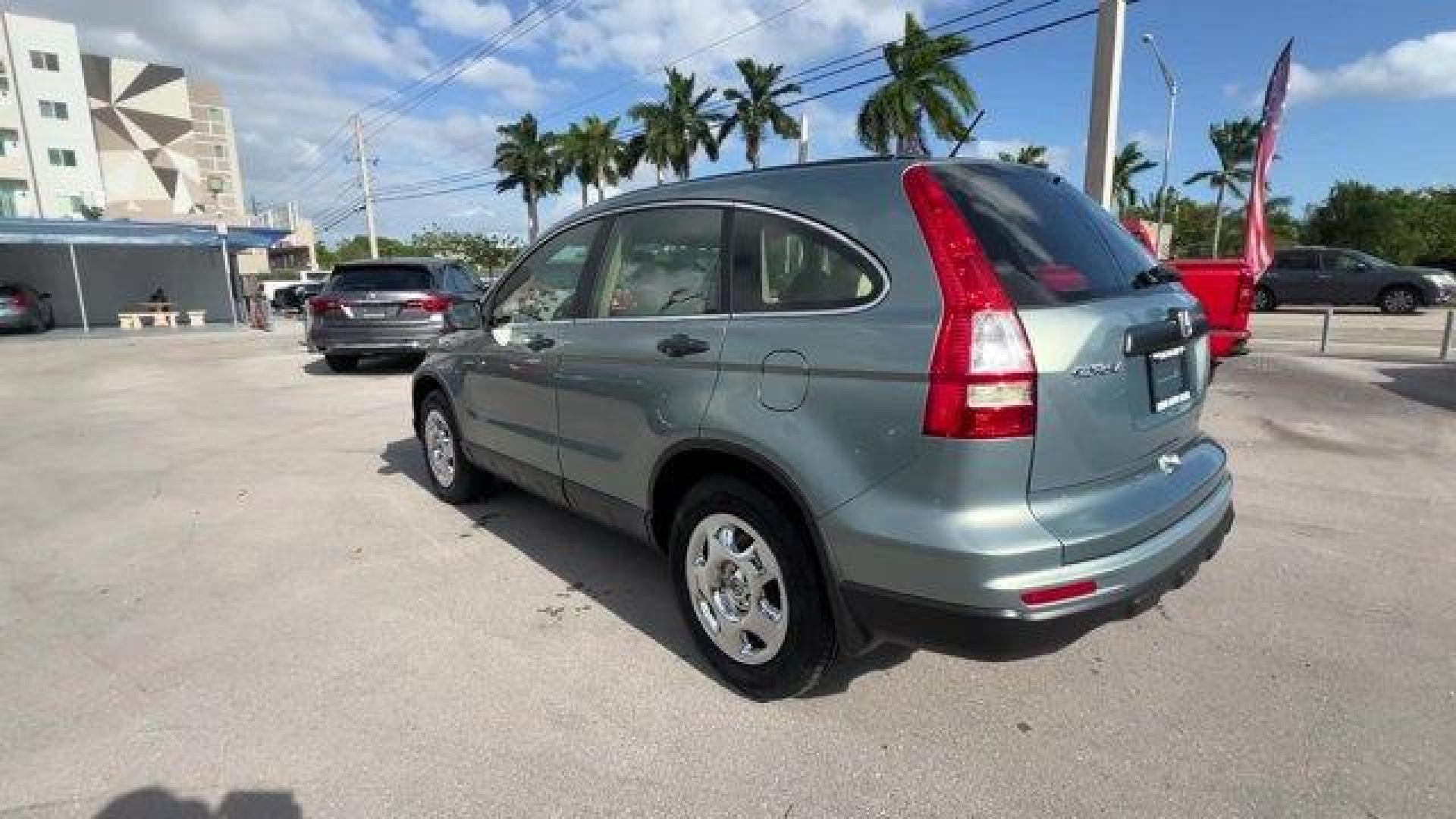 2011 Gray Honda CR-V (5J6RE3H3XBL) with an 4 2.4L engine, Automatic transmission, located at 27610 S Dixie Hwy, Homestead, FL, 33032, (305) 749-2348, 25.510241, -80.438301 - KBB.com Brand Image Awards. Only 145,688 Miles! Boasts 28 Highway MPG and 21 City MPG! This Honda CR-V boasts a Gas I4 2.4L/144 engine powering this Automatic transmission. Vehicle Stability Assist (VSA) w/traction control, Variable pwr rack-and-pinion steering, Upper and lower glove compartments. - Photo#1