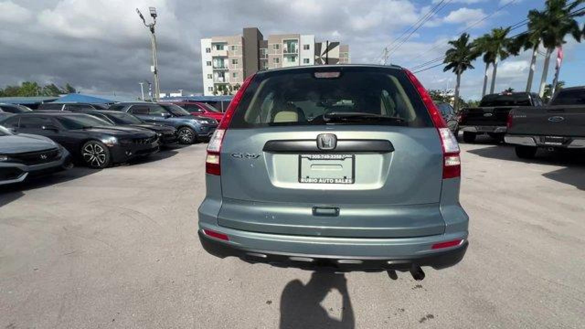 2011 Gray Honda CR-V (5J6RE3H3XBL) with an 4 2.4L engine, Automatic transmission, located at 27610 S Dixie Hwy, Homestead, FL, 33032, (305) 749-2348, 25.510241, -80.438301 - KBB.com Brand Image Awards. Only 145,688 Miles! Boasts 28 Highway MPG and 21 City MPG! This Honda CR-V boasts a Gas I4 2.4L/144 engine powering this Automatic transmission. Vehicle Stability Assist (VSA) w/traction control, Variable pwr rack-and-pinion steering, Upper and lower glove compartments. - Photo#2