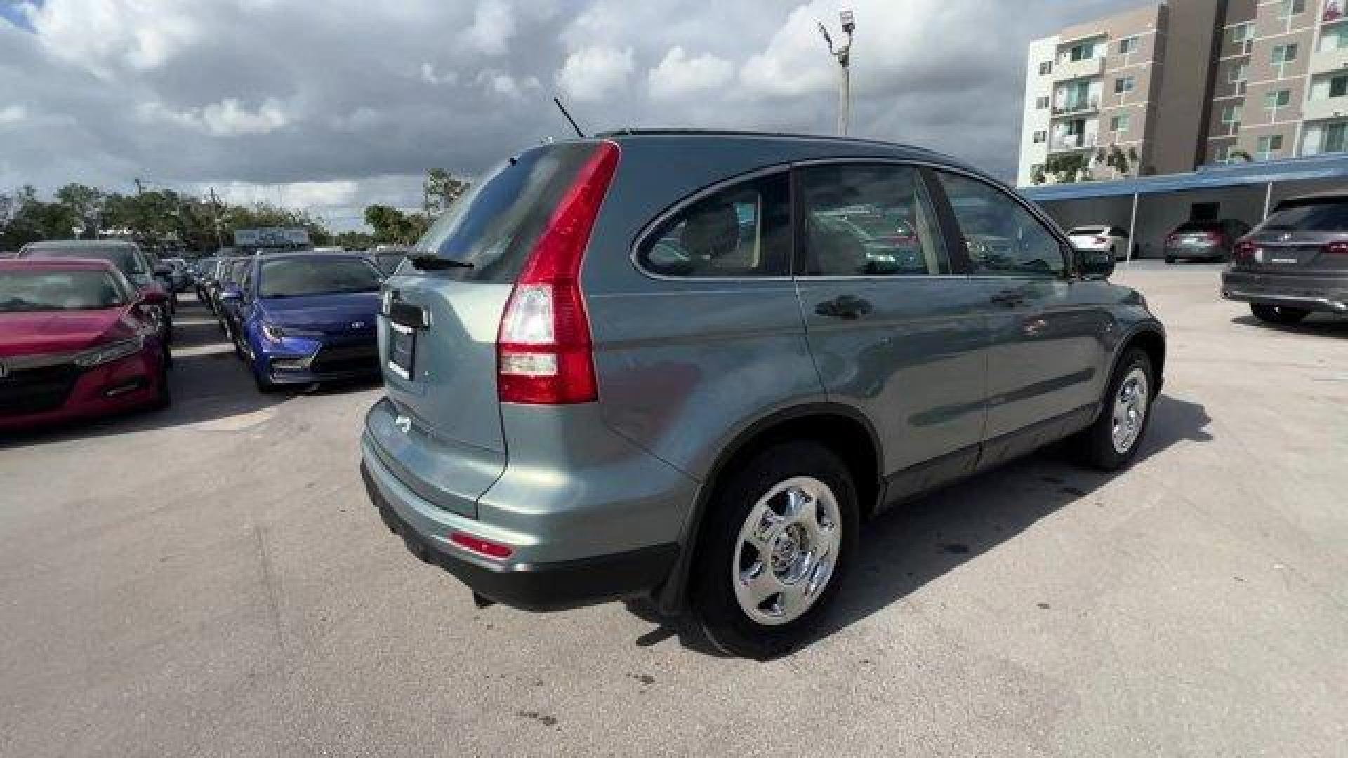 2011 Gray Honda CR-V (5J6RE3H3XBL) with an 4 2.4L engine, Automatic transmission, located at 27610 S Dixie Hwy, Homestead, FL, 33032, (305) 749-2348, 25.510241, -80.438301 - KBB.com Brand Image Awards. Only 145,688 Miles! Boasts 28 Highway MPG and 21 City MPG! This Honda CR-V boasts a Gas I4 2.4L/144 engine powering this Automatic transmission. Vehicle Stability Assist (VSA) w/traction control, Variable pwr rack-and-pinion steering, Upper and lower glove compartments. - Photo#3